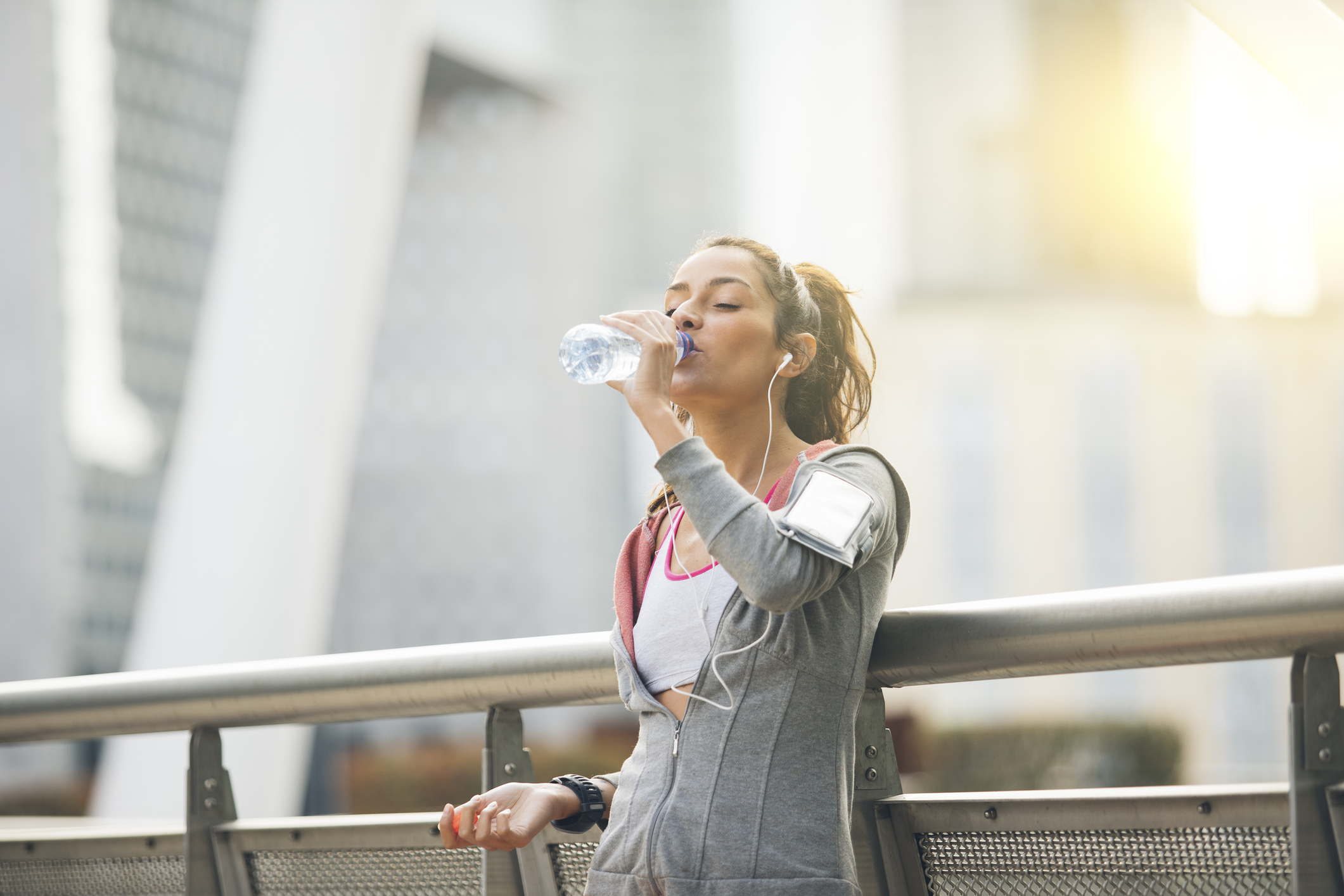 Generic photo of a young woman drinking water after going for a run (ThinkStock/PA)