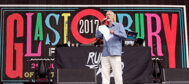 Labour leader Jeremy Corbyn speaks to the crowd from the Pyramid stage at Glastonbury Festival, at Worthy Farm in Somerset.