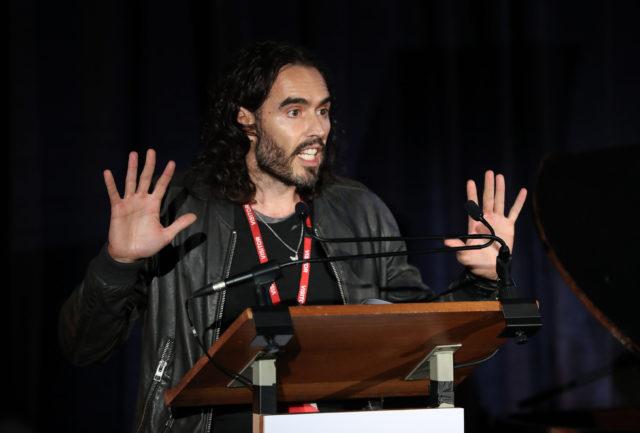 Russell Brand performs during the 'Letters Live' event at HMP Brixton, London.