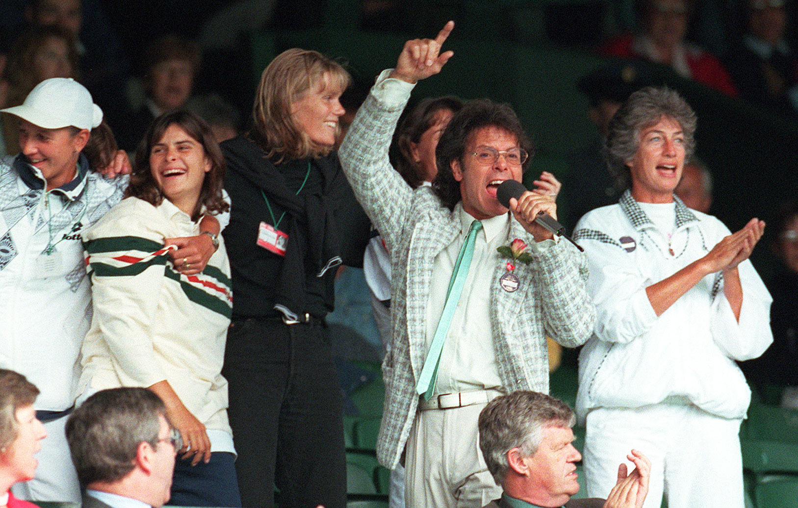 Sir Cliff Richard leads the singing on Centre Court (Adam Butler/PA)