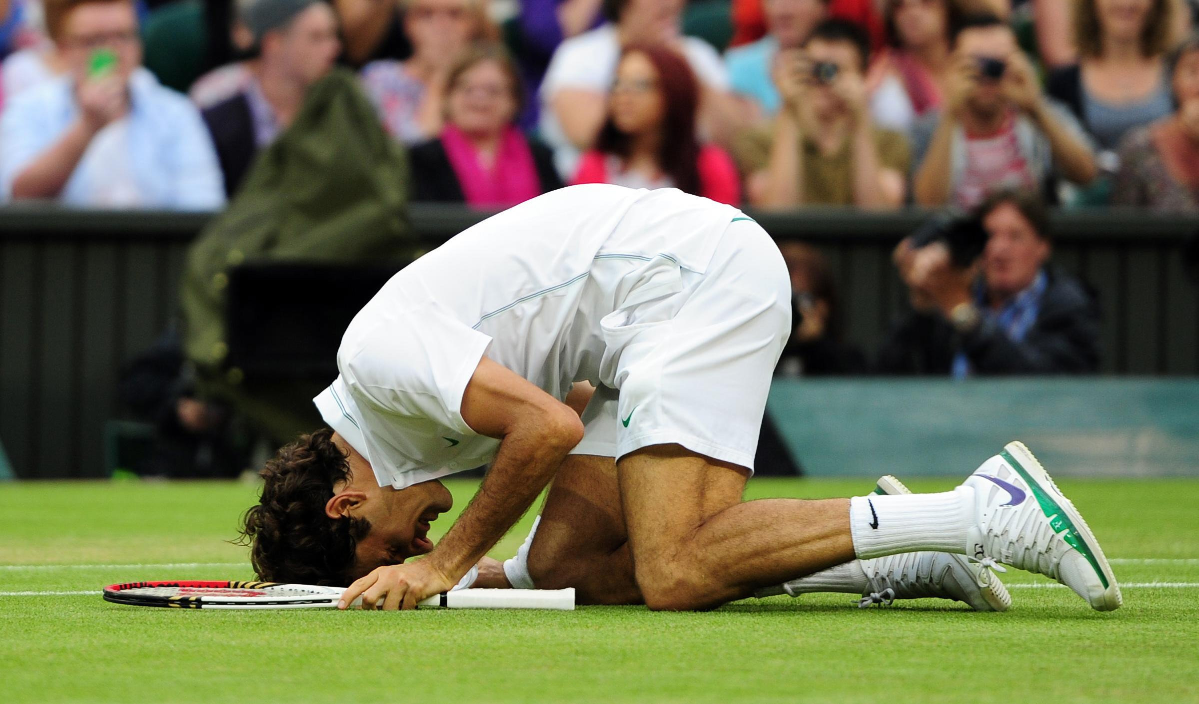 Roger Federer celebrates defeating Andy Murray (Adam Davy/PA)