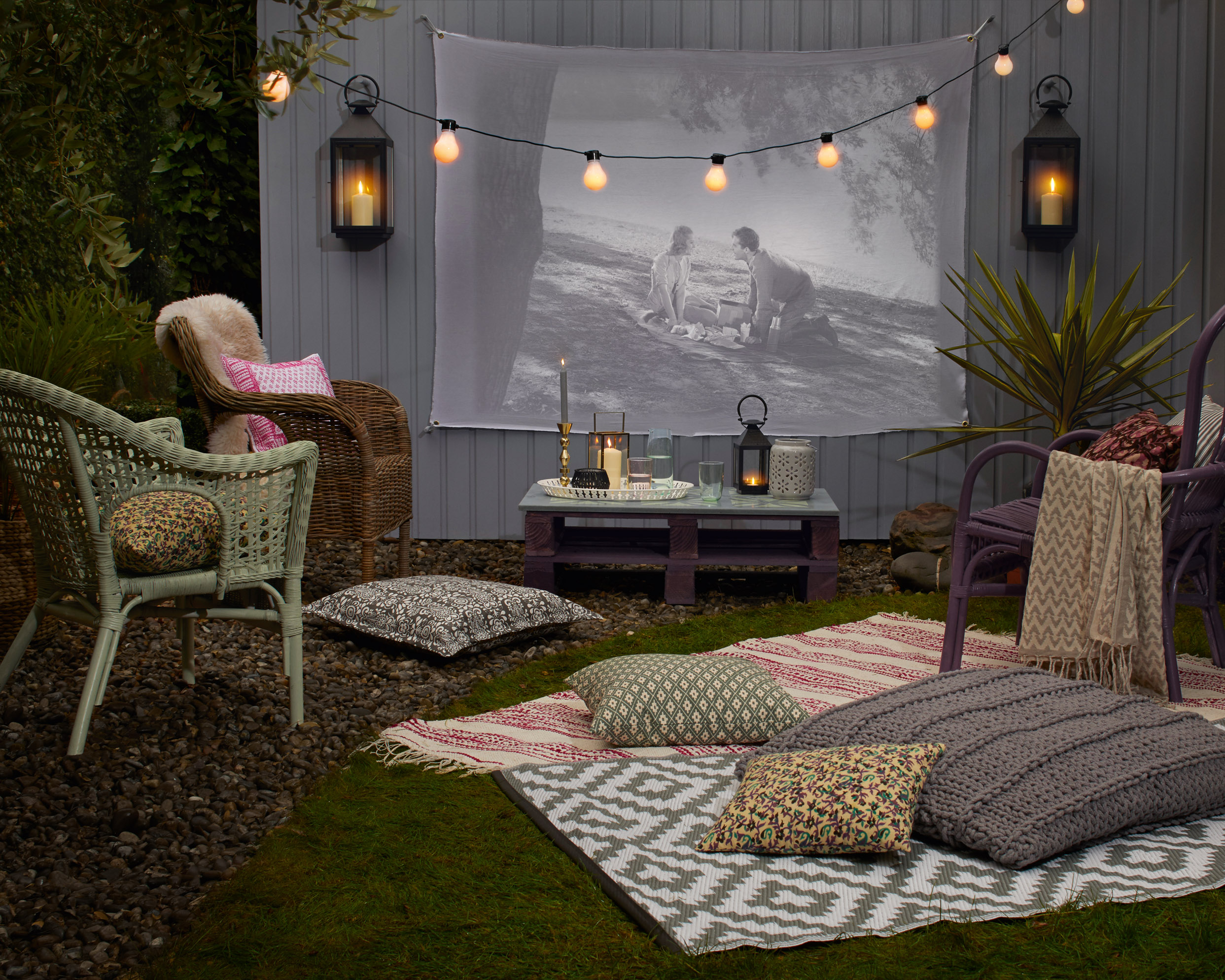 Move magic: Fence painted with Dusky Gem, and chairs painted with Fresh Rosemary and Lavender from Cuprinol's Garden Shades collection, from £14.98 for 1L (Cuprinol/PA)
