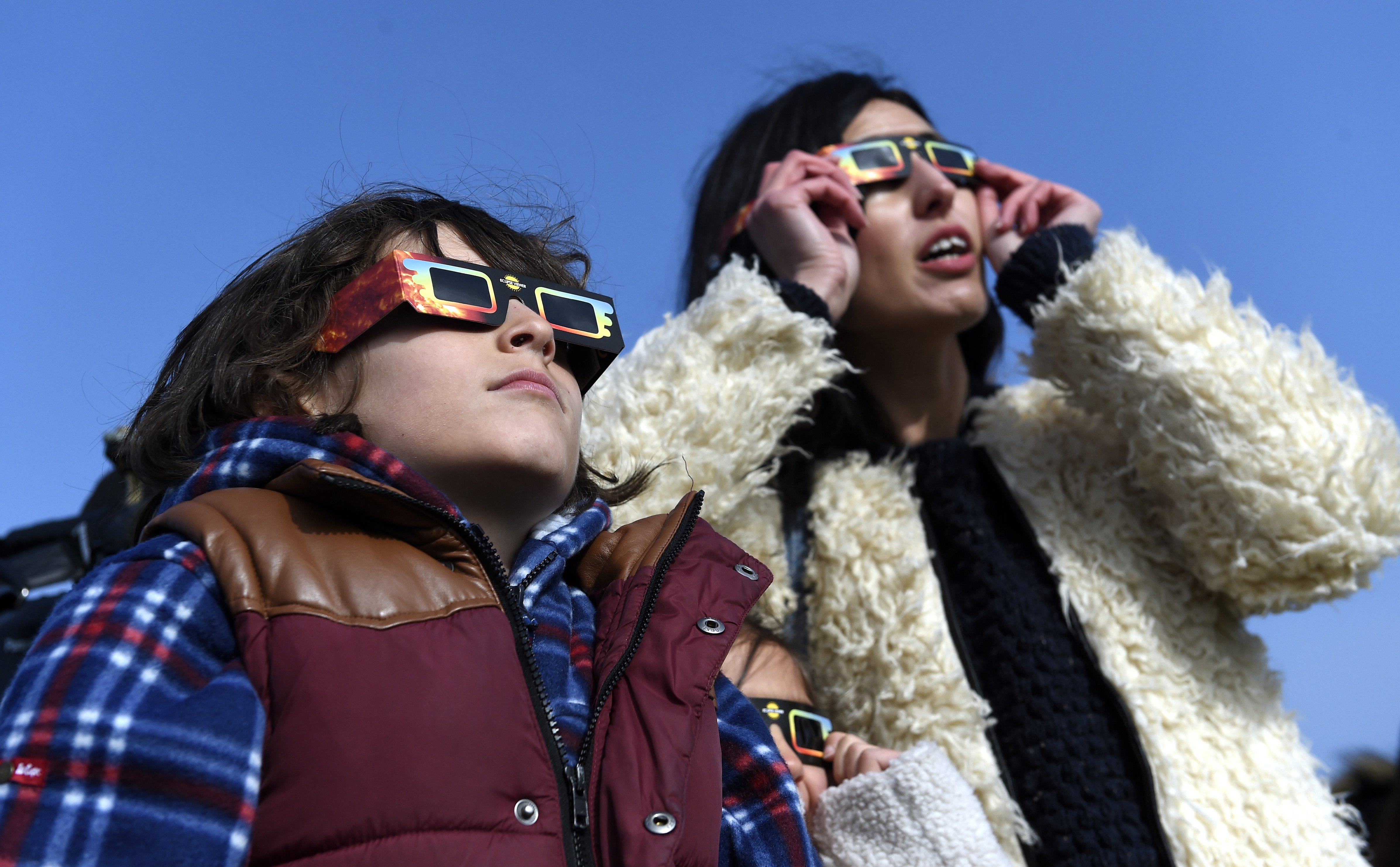 People watching the solar eclipse.