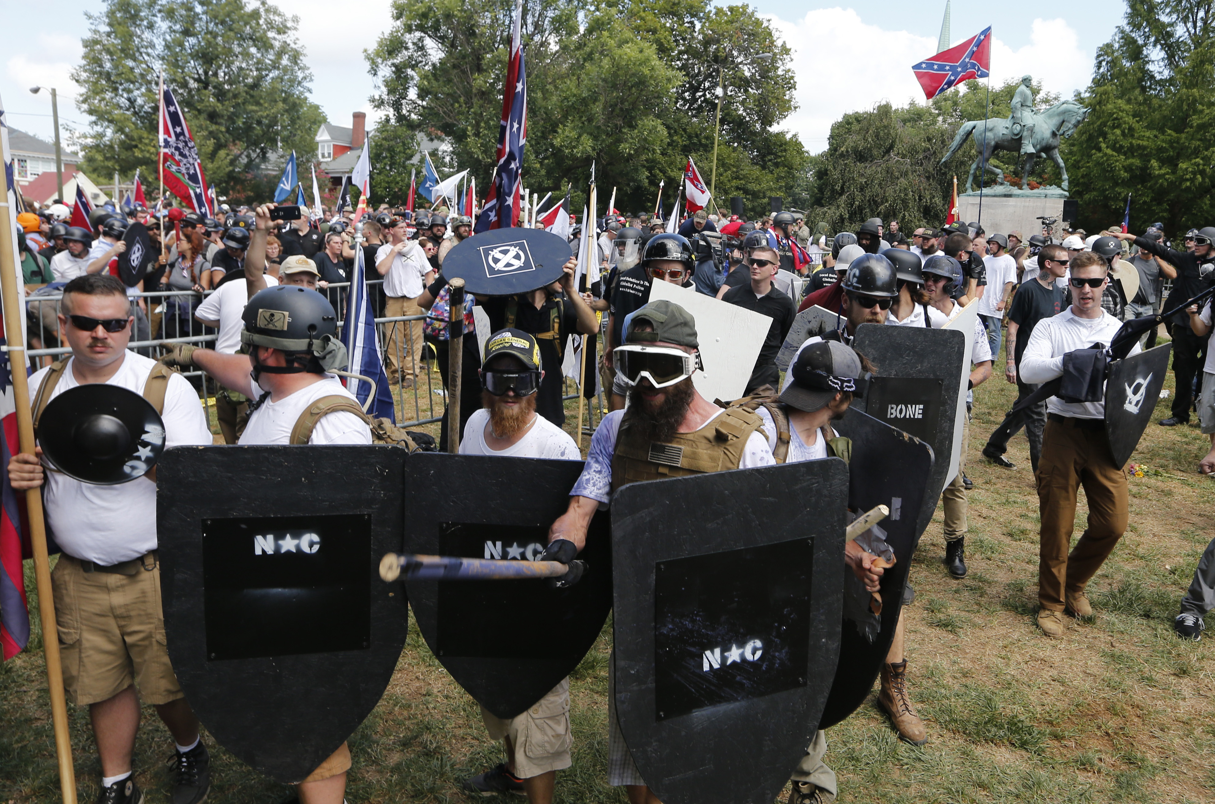 White nationalist demonstrators hold their ground