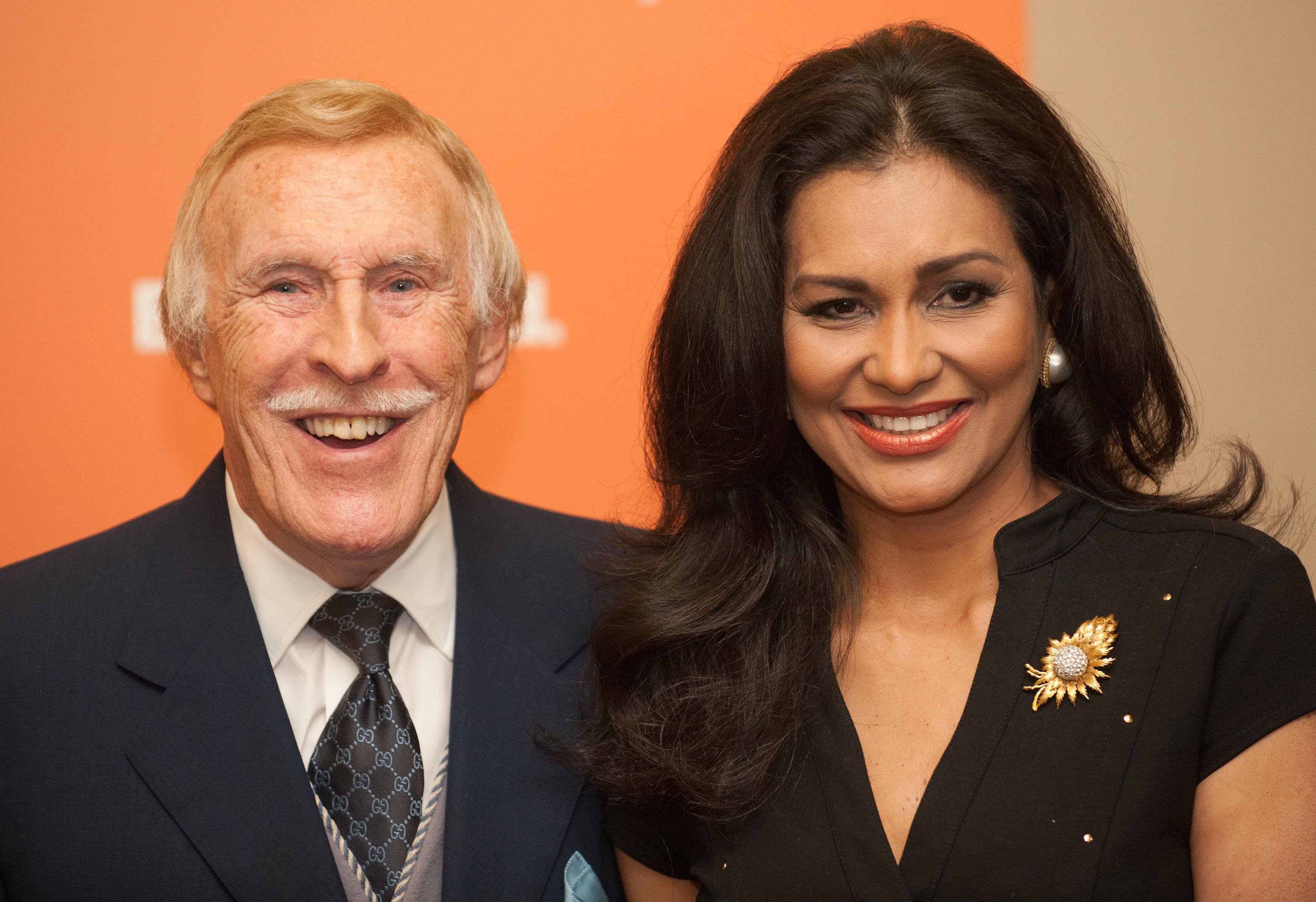 Sir Bruce Forsyth and his wife Wilnelia