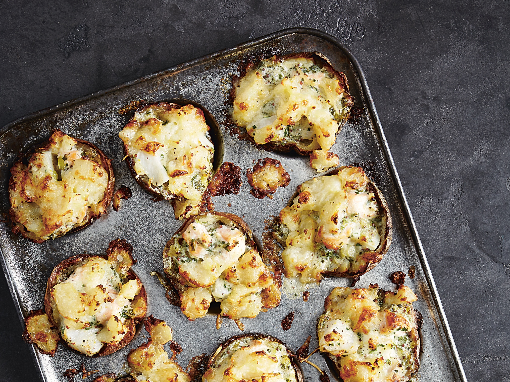 Potato skin fish pies from John Whaite's Comfort published by Kyle Books (Nassima Rothacker/PA)