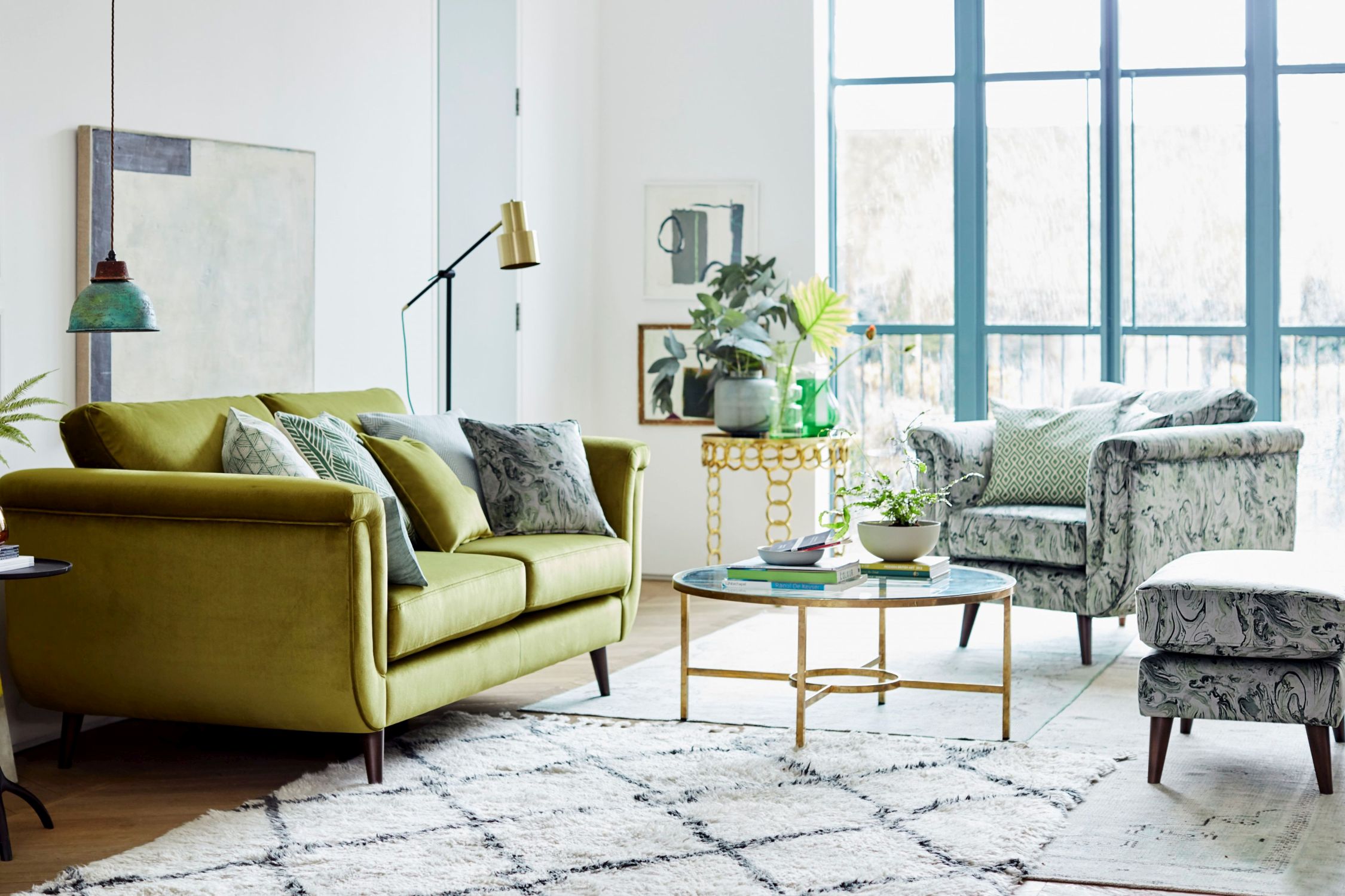 Topaz sofa, £1,598 and pattern standard chair, £1,098 and pattern rectangular footstool, £698, DFS (DFS/PA)