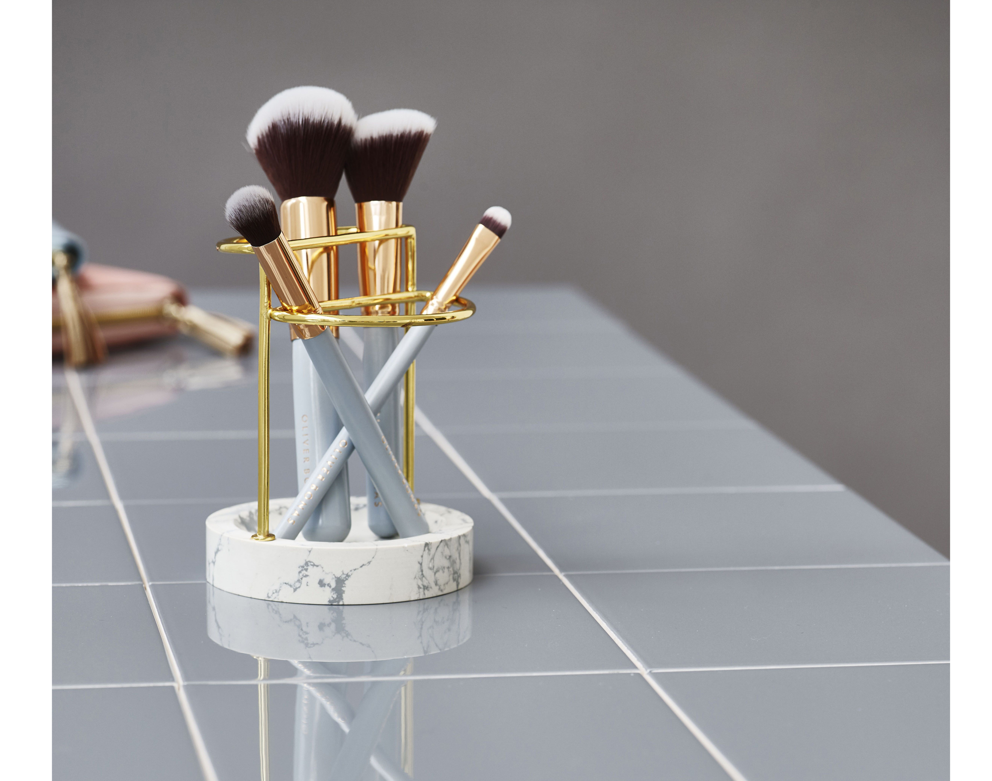 Stonedust Brush Holder, £24; Set of Make Up Brushes, £38 for pack of five with compact mirror, Oliver Bonas