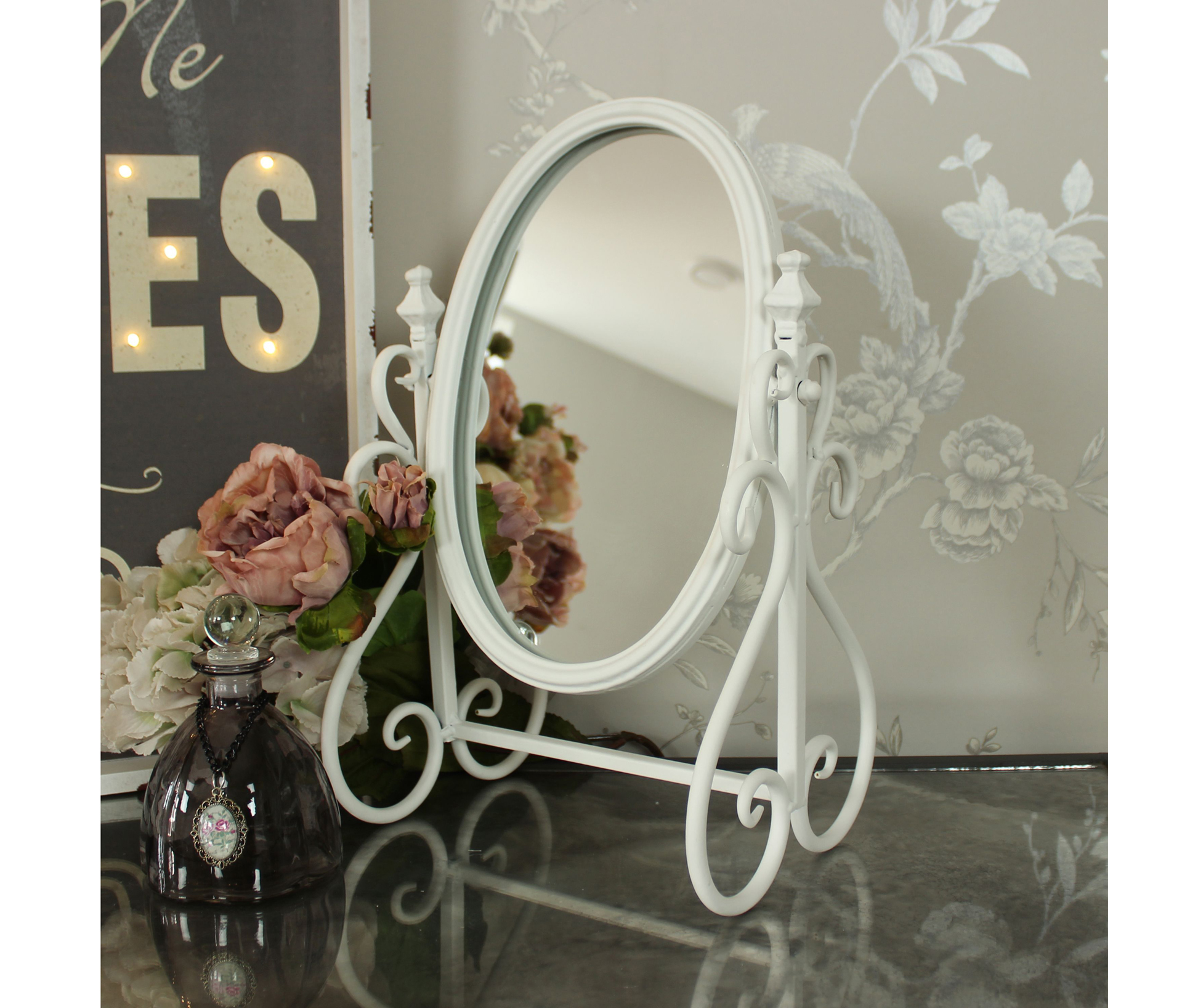 Ivory Metal Swing Mirror, £32.95, Melody Maison