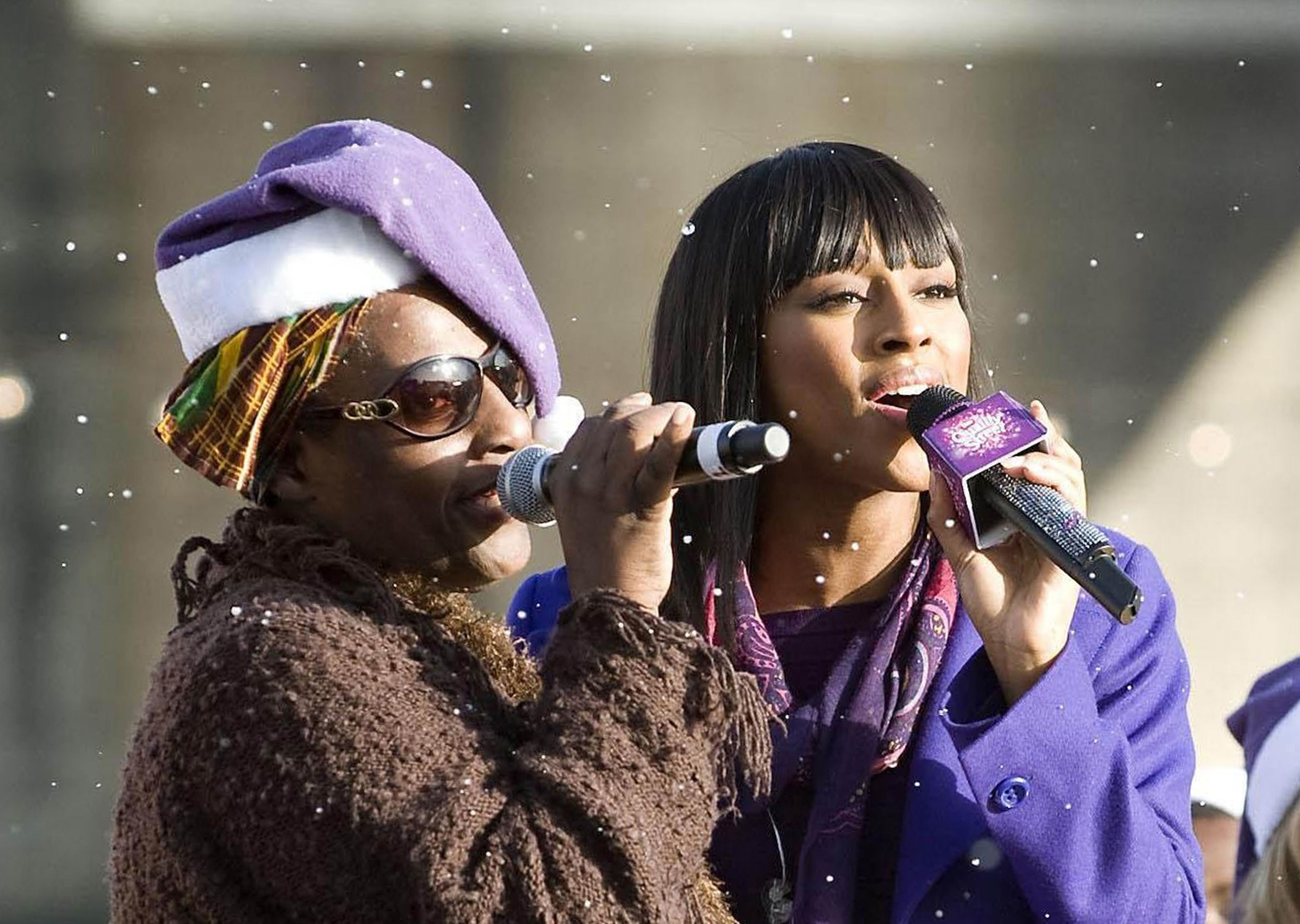 Alexandra Burke singing with her mother Melissa Bell, who was a member of the Grammy-winning group, Soul II Soul. (Matt Crossick/PA