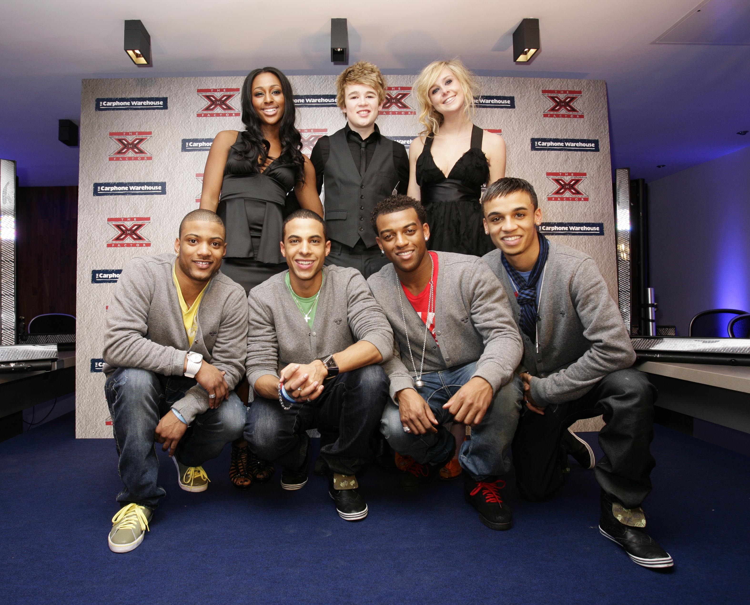 Alexandra Burke, Eoghan Quigg, Diana Vickers and boyband JLS (front) at an X Factor gig in 2008. (Yui Mok/PA)