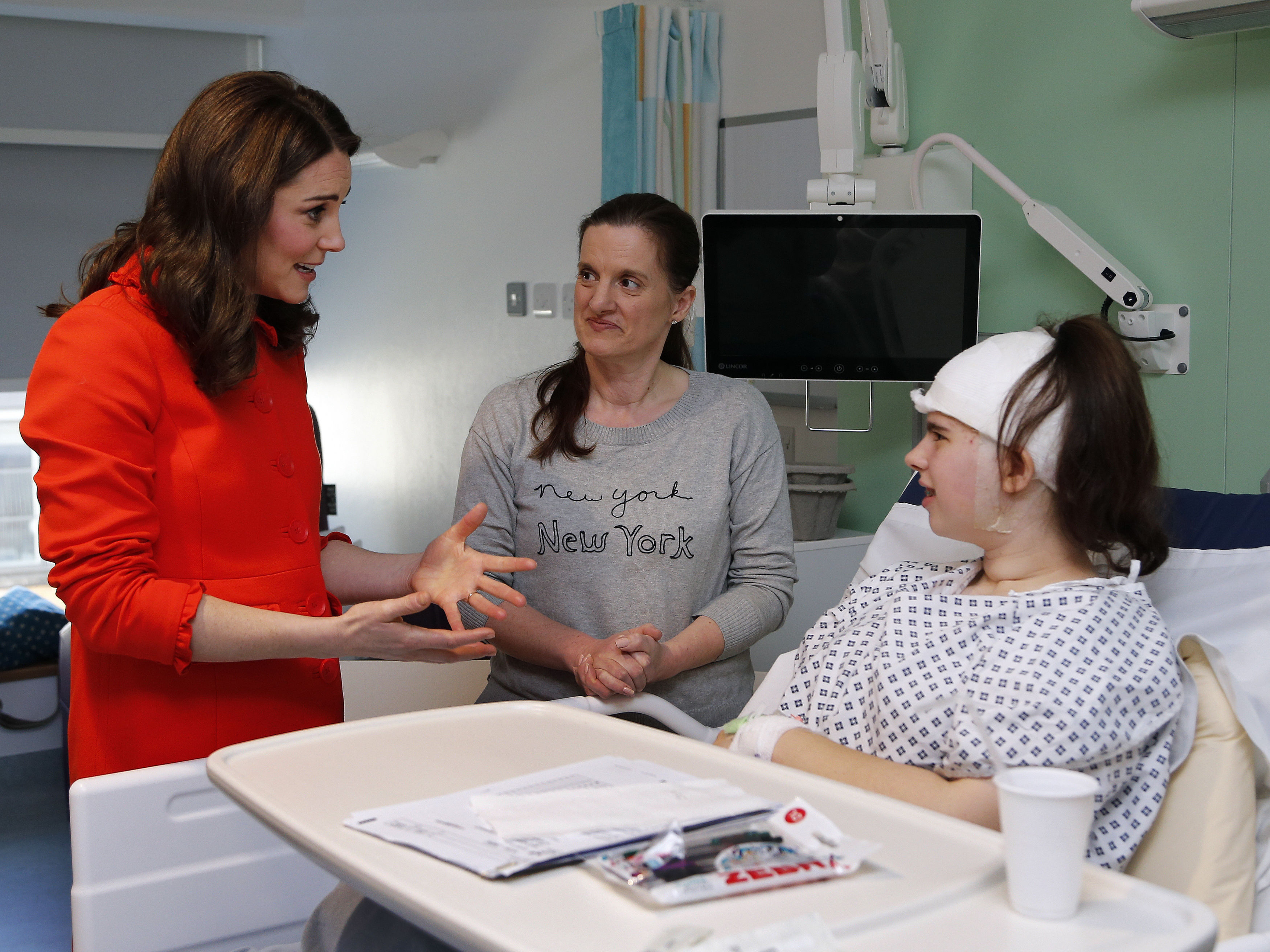 The Duchess of Cambridge speaks to patient Oriel Gray, 14, as she officially opens the Mittal Children's Medical Centre during a visit to Great Ormond Street Hospital 