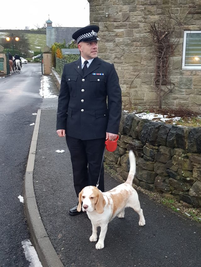 A police officer with Pc Dave Fields's dog, Bertie, ahead of the funeral in Sheffield (Dave Higgens/PA)