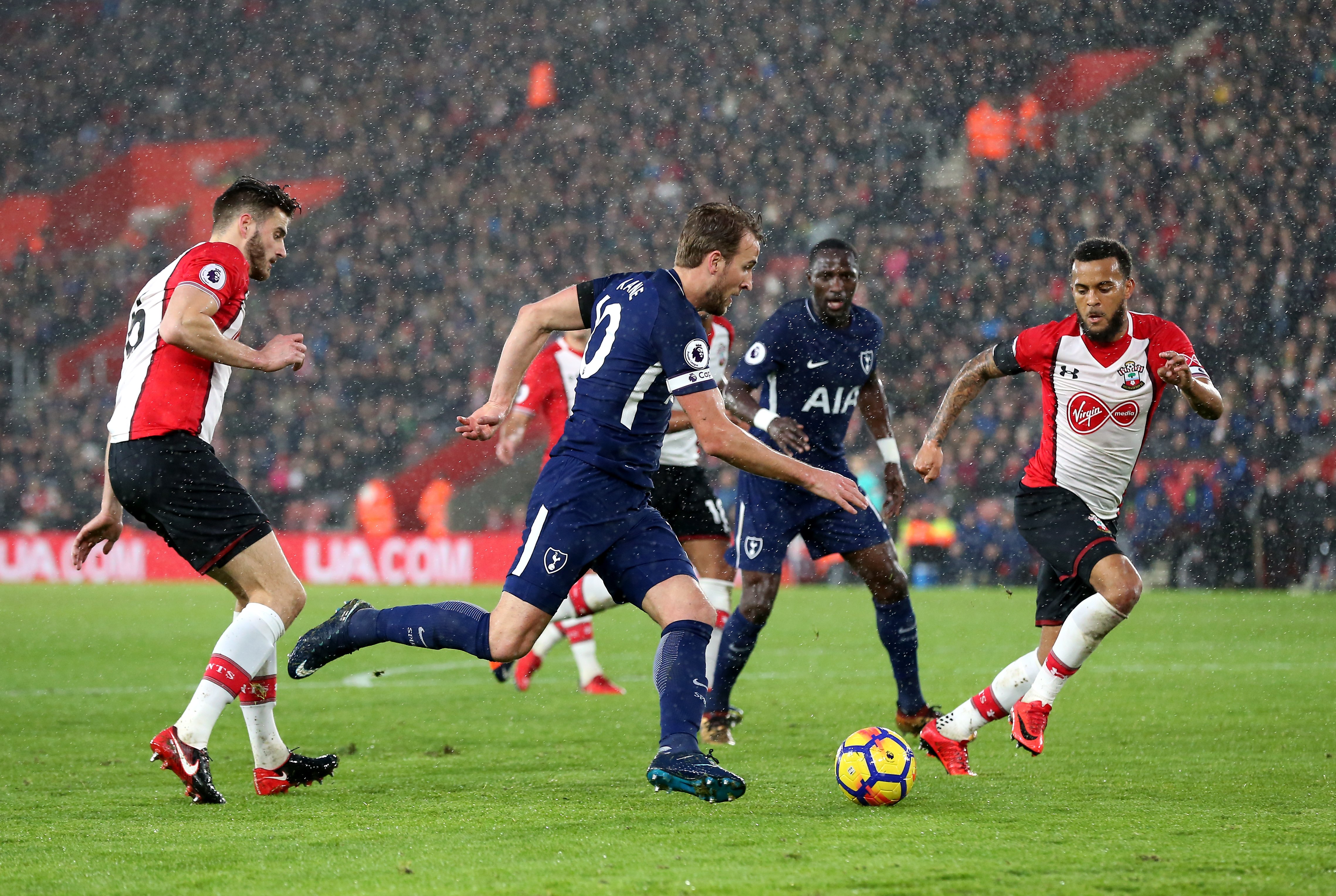 Tottenham Hotspur's Harry Kane as Southampton's Wesley Hoedt attempts a tackle 