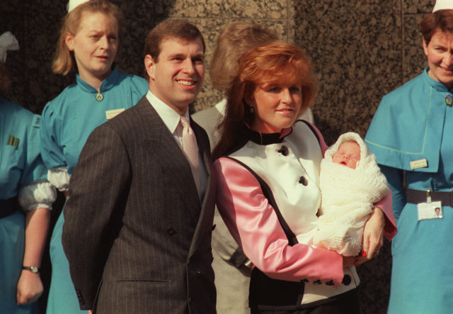 The Duke and Duchess of York pause outside the Portland Hospital in London in March 1990 with new arrival Princess Eugenie (Martin Keene/PA)