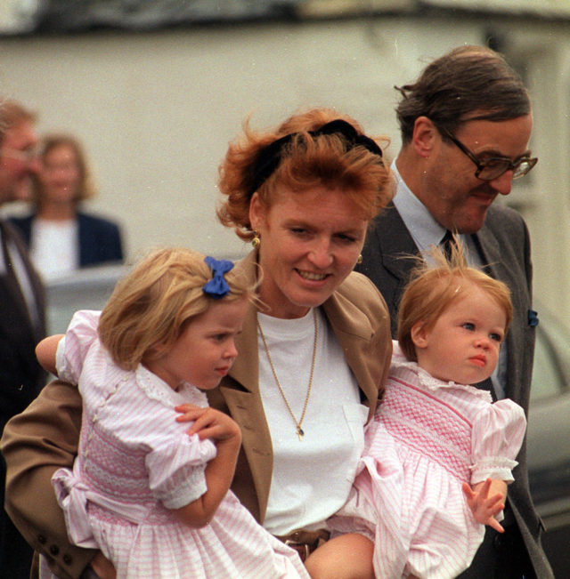 Princess Eugenie (right) joins her mother and sister Princess Beatrice at Corpach, near Fort William in August 1991, as they boarded the royal barge to join Britannia (Chris Bacon/PA)