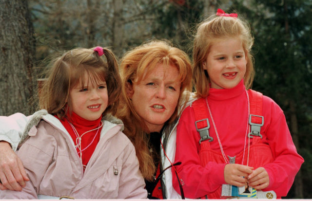 The Duchess of York poses with Eugenie (left) and Beatrice in Verbier, Switzerland in April 1996 (Tim Ockenden/PA)