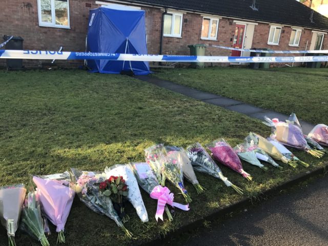 Floral tributes in remembrance of Mylee Billingham outside the property in Brownhills, near Walsall, where the eight-year-old was found with fatal knife wounds on Saturday (Phil Barnett/PA)