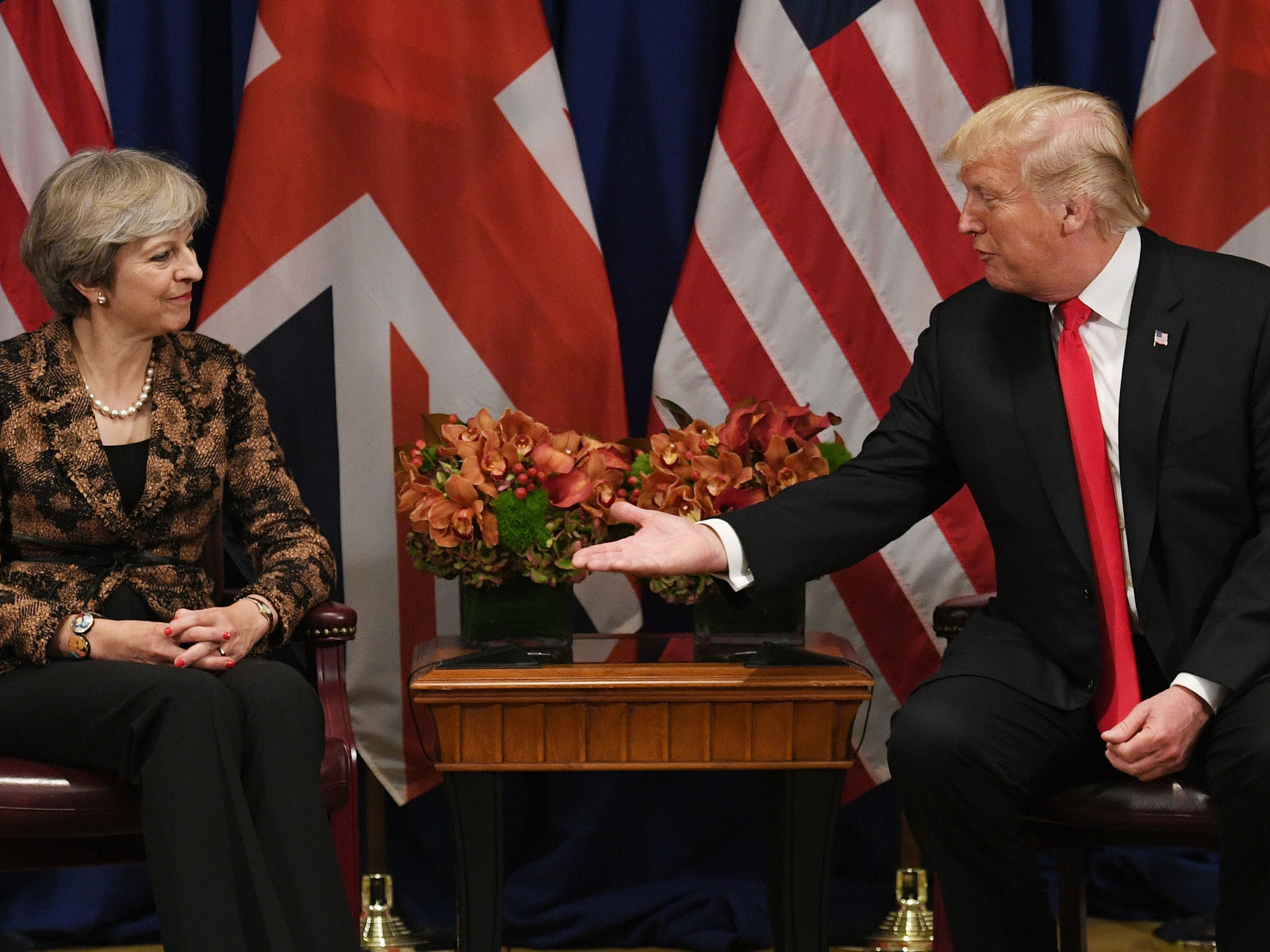 Theresa May and Donald Trump exchange cordialities during a meeting in New York (Stefan Rousseau/PA)