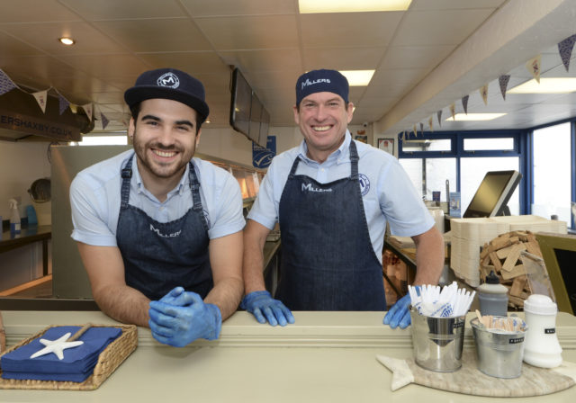 Nick Miller, left, and father David Miller, of Millers Fish and Chips, Haxby, North Yorkshire (Mike Cowling/PA)