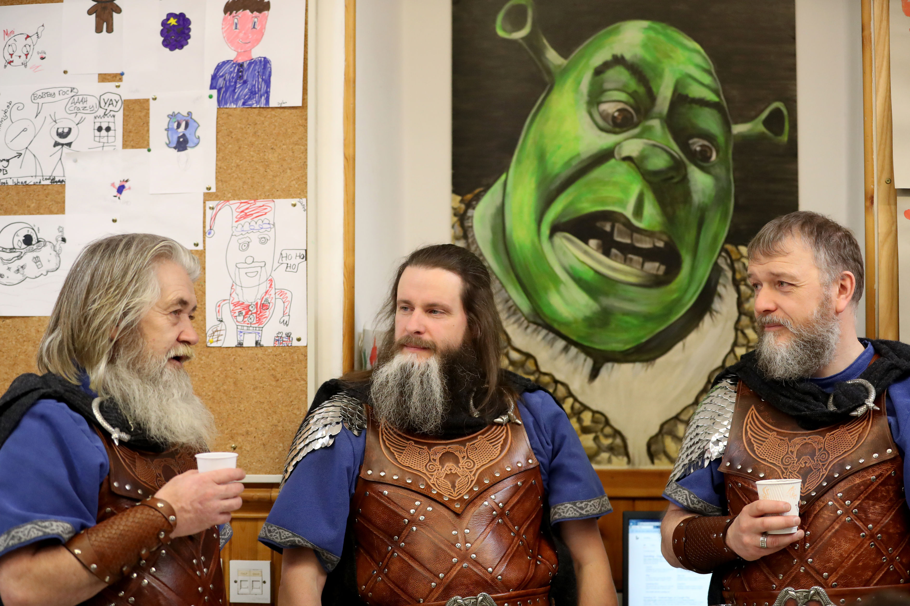 Shrek looks on disapprovingly as members of the Jarl Squad take a tea break (Jane Barlow/PA)