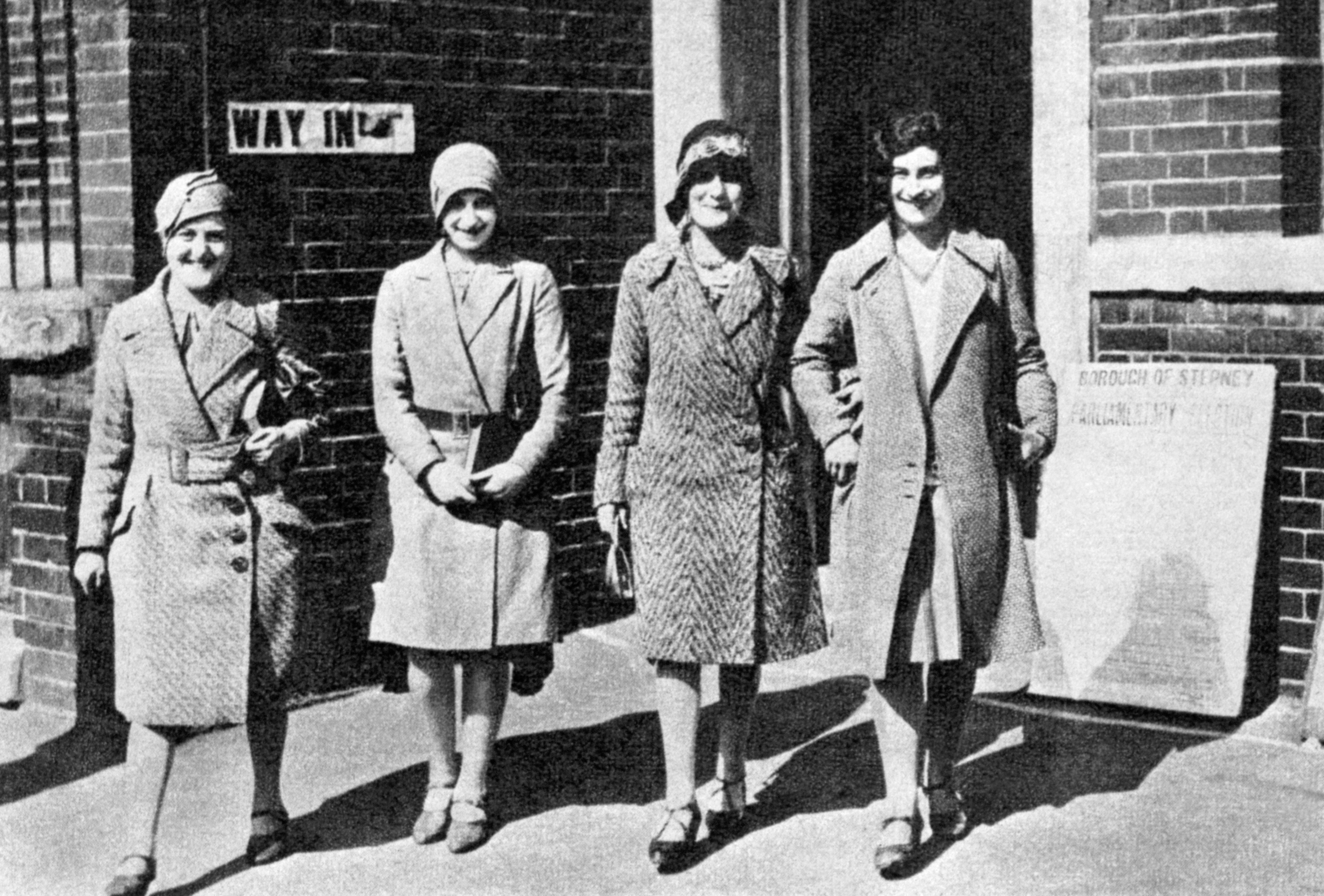Universal adult suffrage came to Britain in 1929 and these women, between the ages of 21 and 28, trooped down to the polling station in Stepney, east London, to vote for the first time (PA)