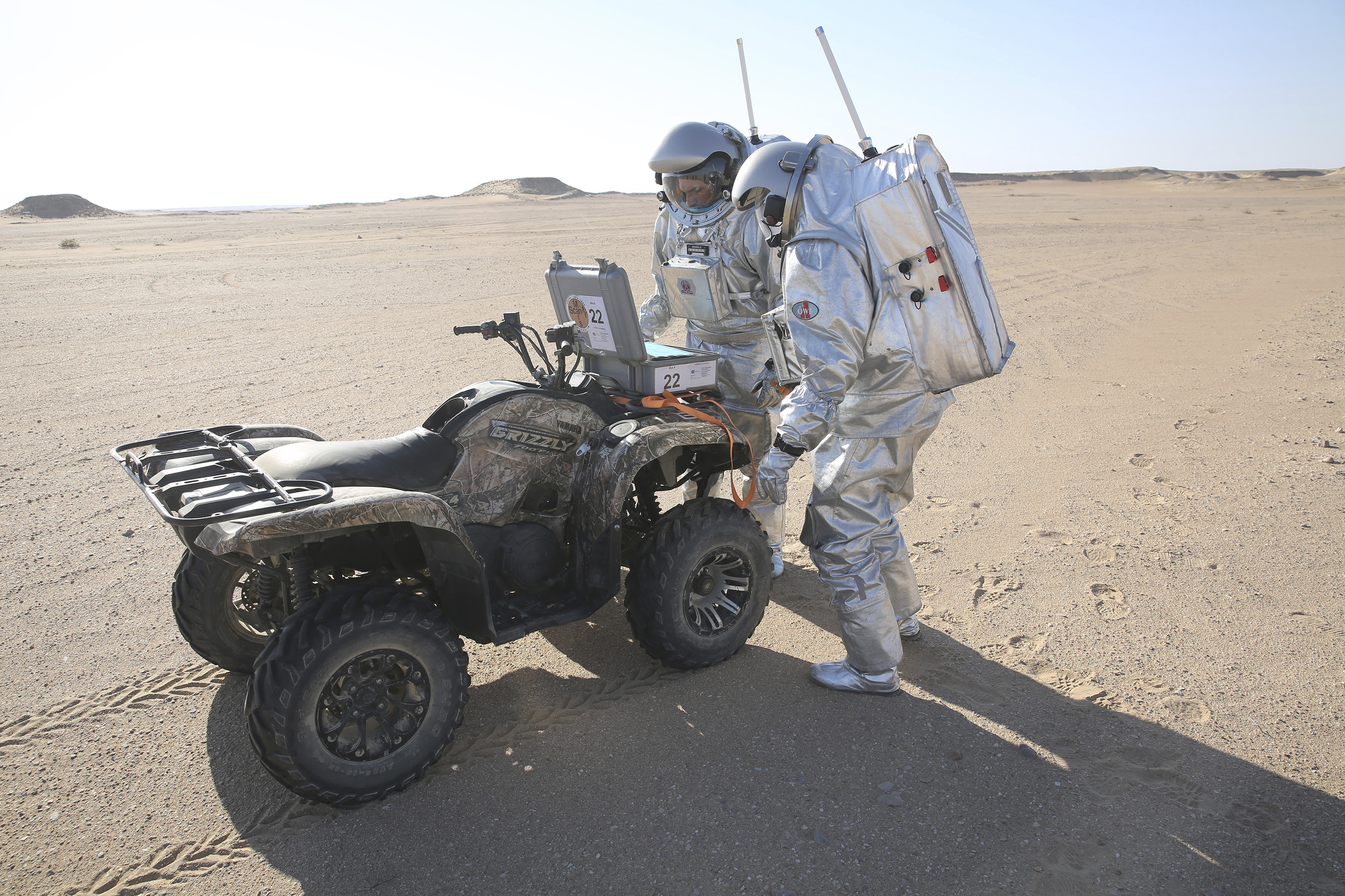 Two scientists test space suits and a geo-radar for use in a future Mars mission in the Dhofar desert of southern Oman (Sam McNeil/PA)