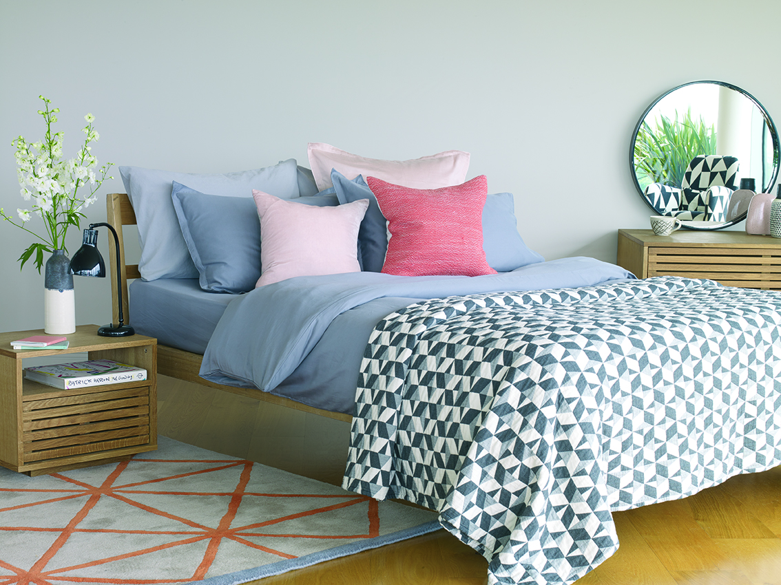 Tatsuma Double Bed Frame £375; Max Oiled Oak Bedside Table with Shelf, £180; Grid Rug, £350; Washed Grey Sateen Double Duvet Cover Set, £90; Paulista Quilted Bedspread, £150; Nixon Cushion, £25, Habitat (Habitat/PA)