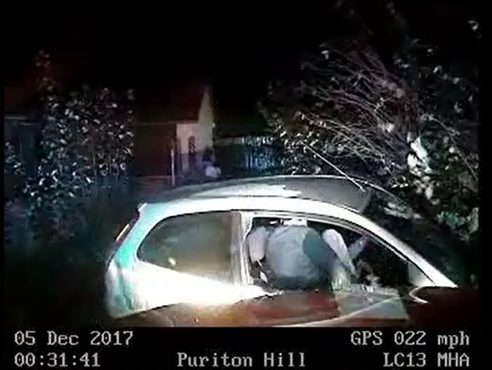 Callum Molloy exits his Ford Fiesta following a high-speed pursuit with police (Avon and Somerset Police/PA)