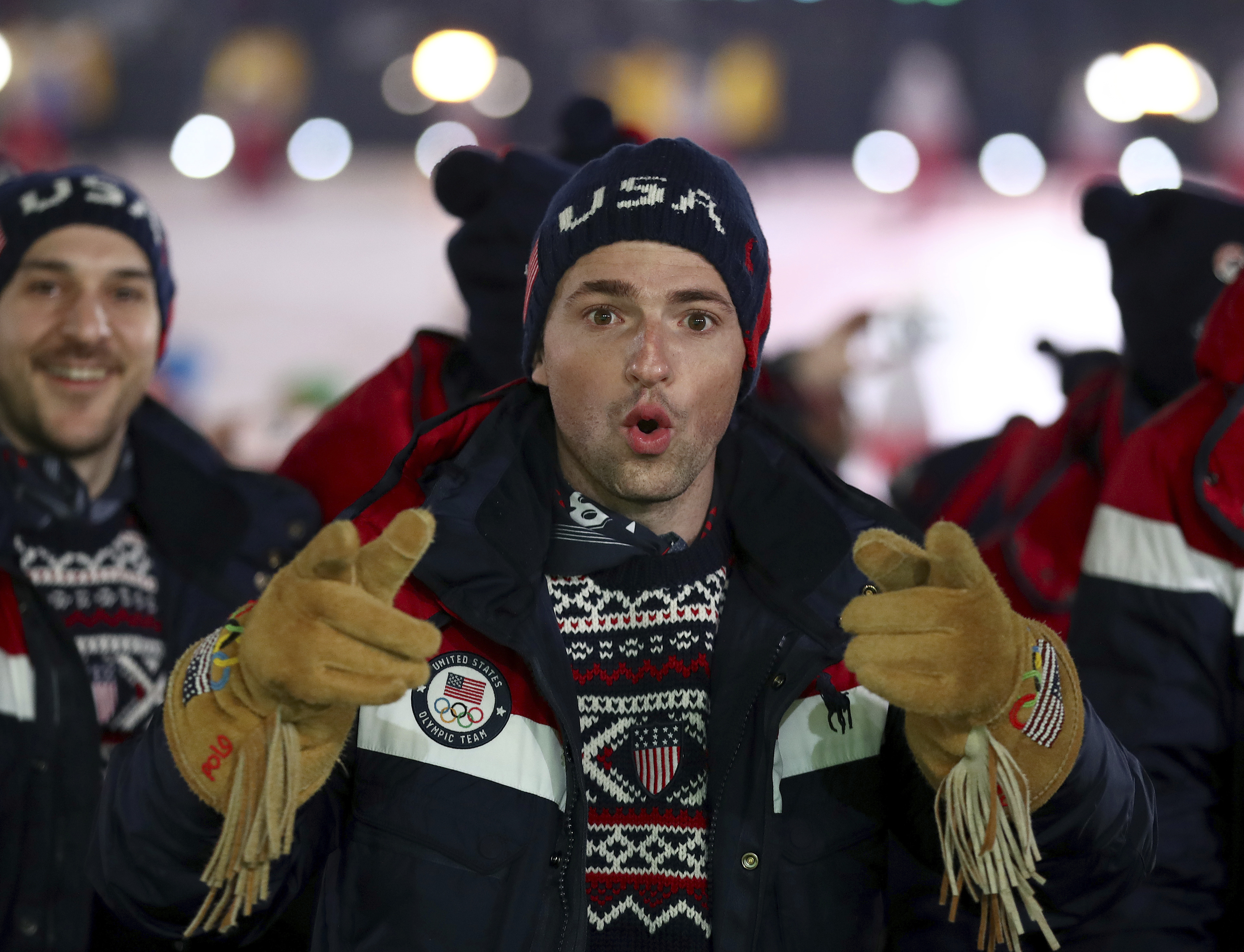 An athlete from team USA arrives at the opening ceremony at the 2018 Winter Olympic Games in Pyeongchang