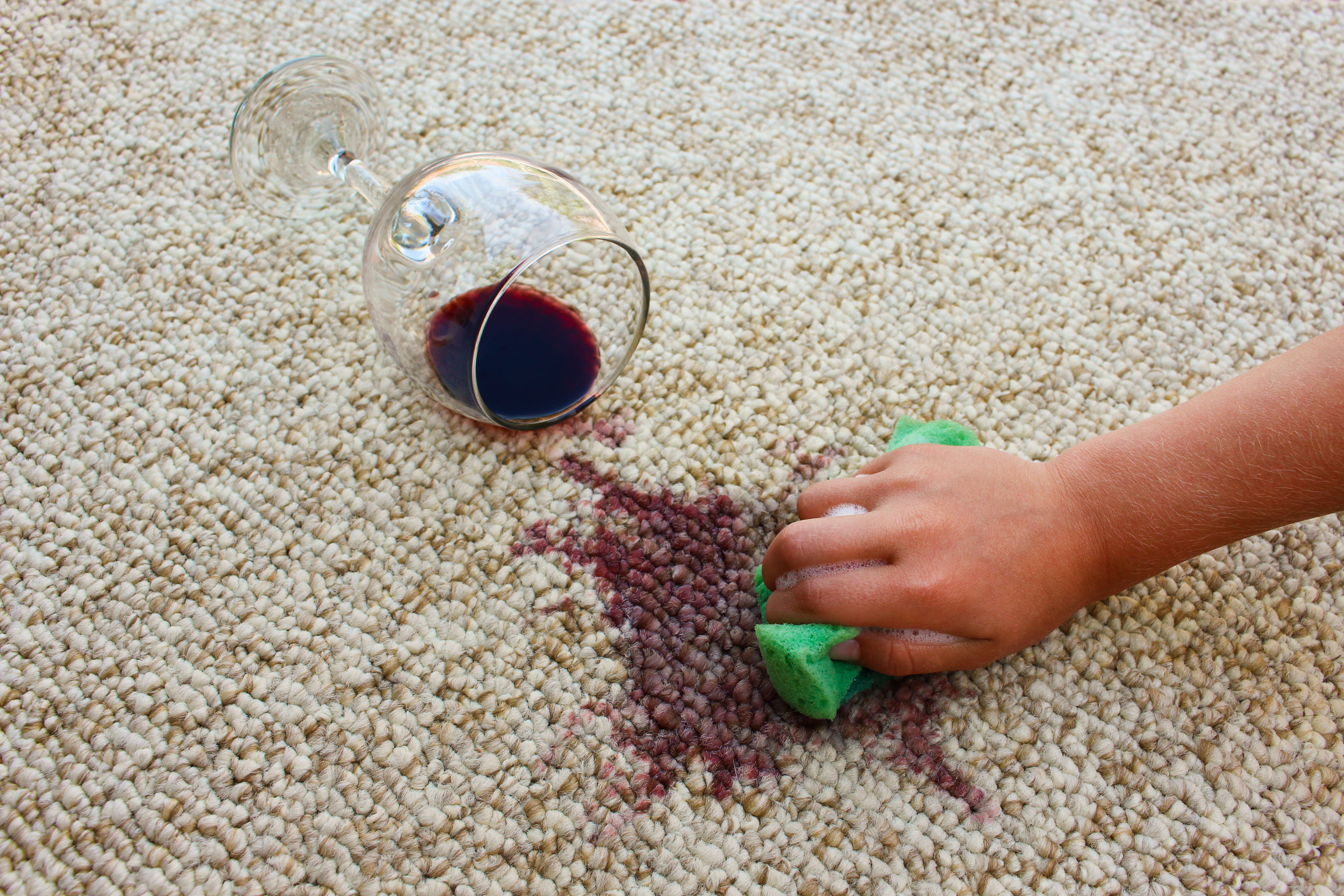 Red wine spillage on carpet