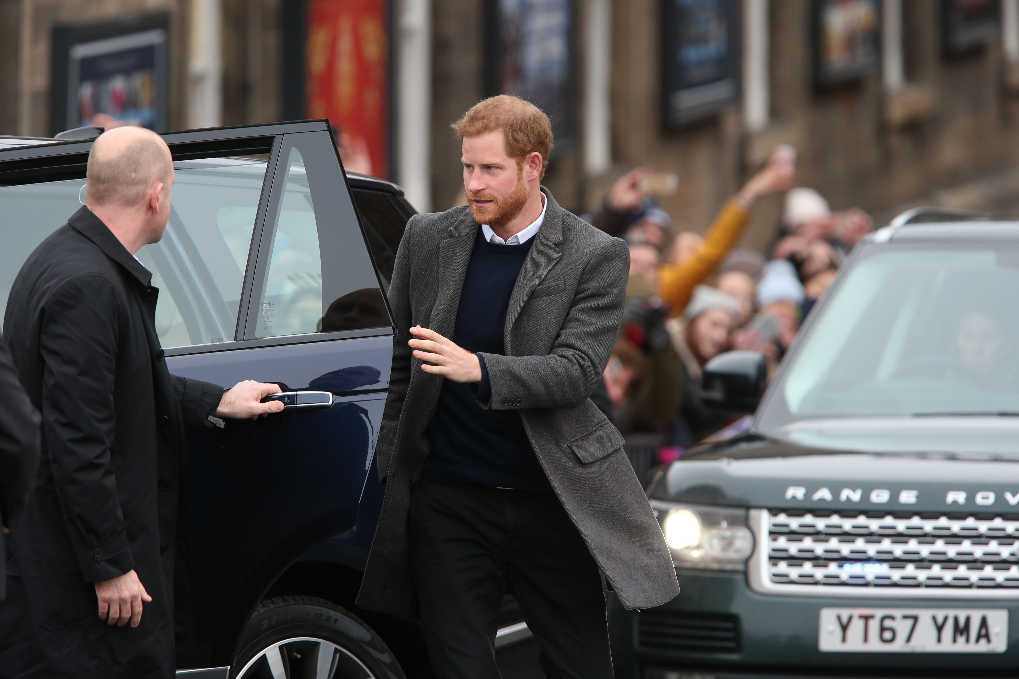 Prince Harry prepares to start his walkabout on the esplanade at Edinburgh Castle (Andrew Milligan/PA)