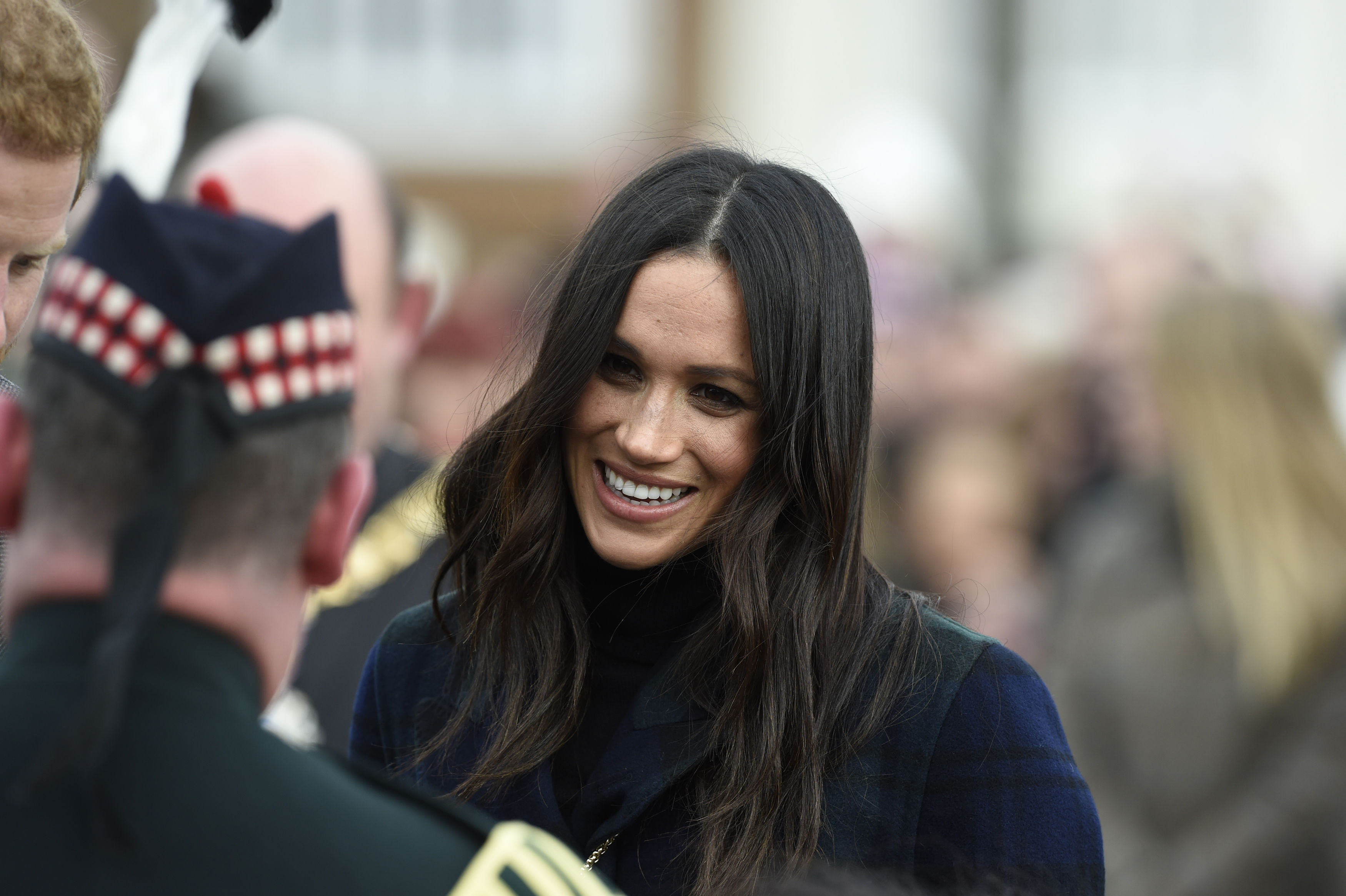 Ms Markle meets Pony Major Wilkinson during a walkabout (Ian Rutherford/PA)