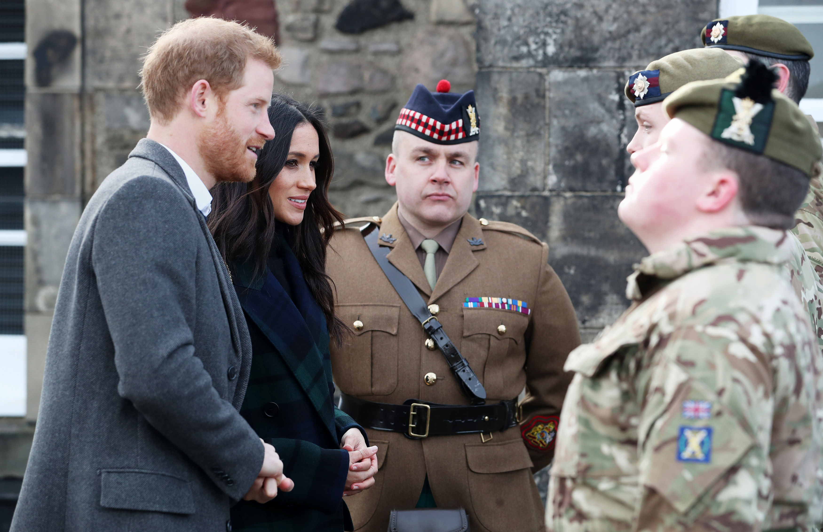 Harry and Ms Markle meet the gunners before the firing of the one o'clock gun (Jane Barlow/PA)