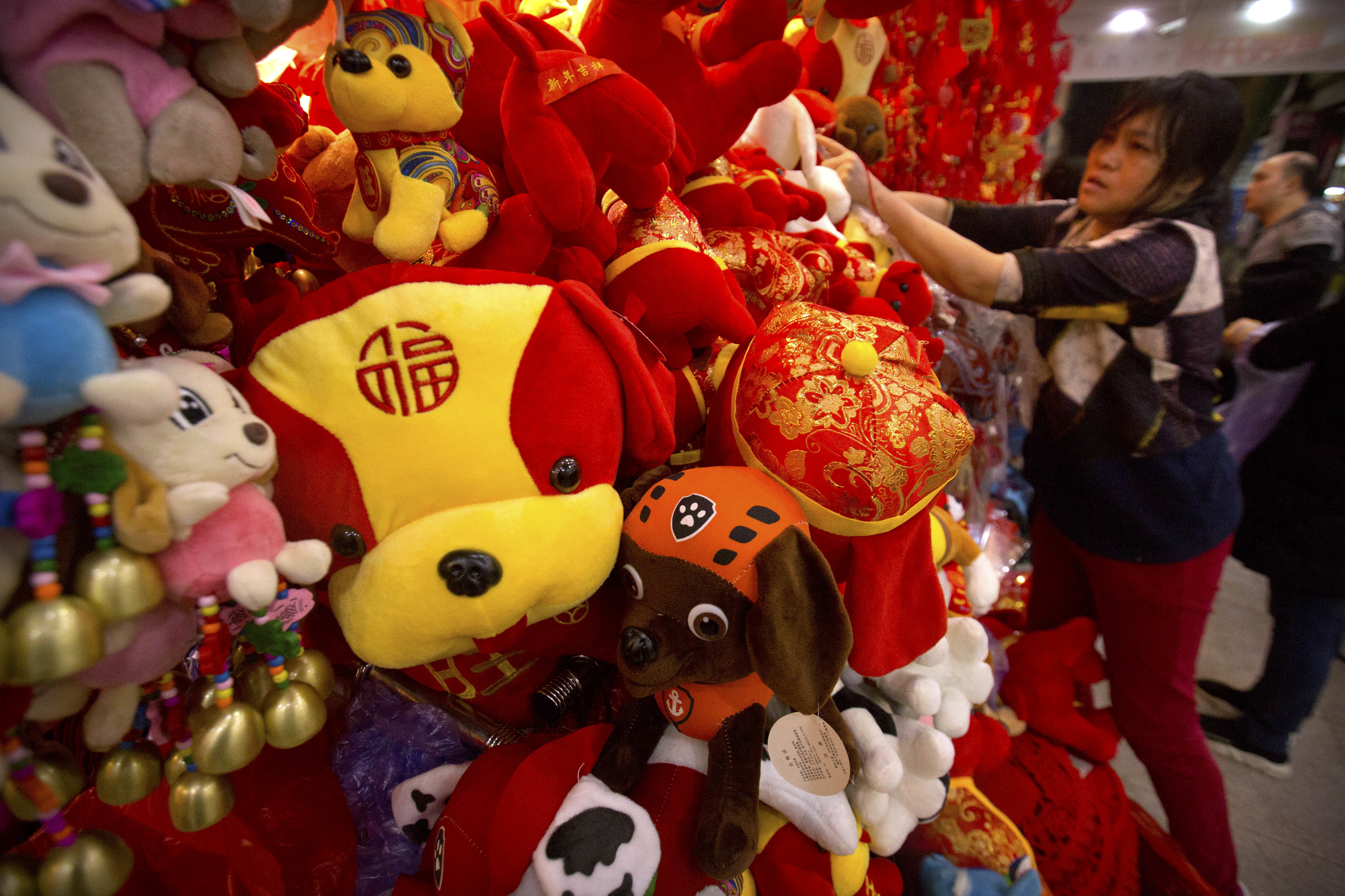 No prizes for guessing it is the Year Of The Dog (Mark Schiefelbein/AP)