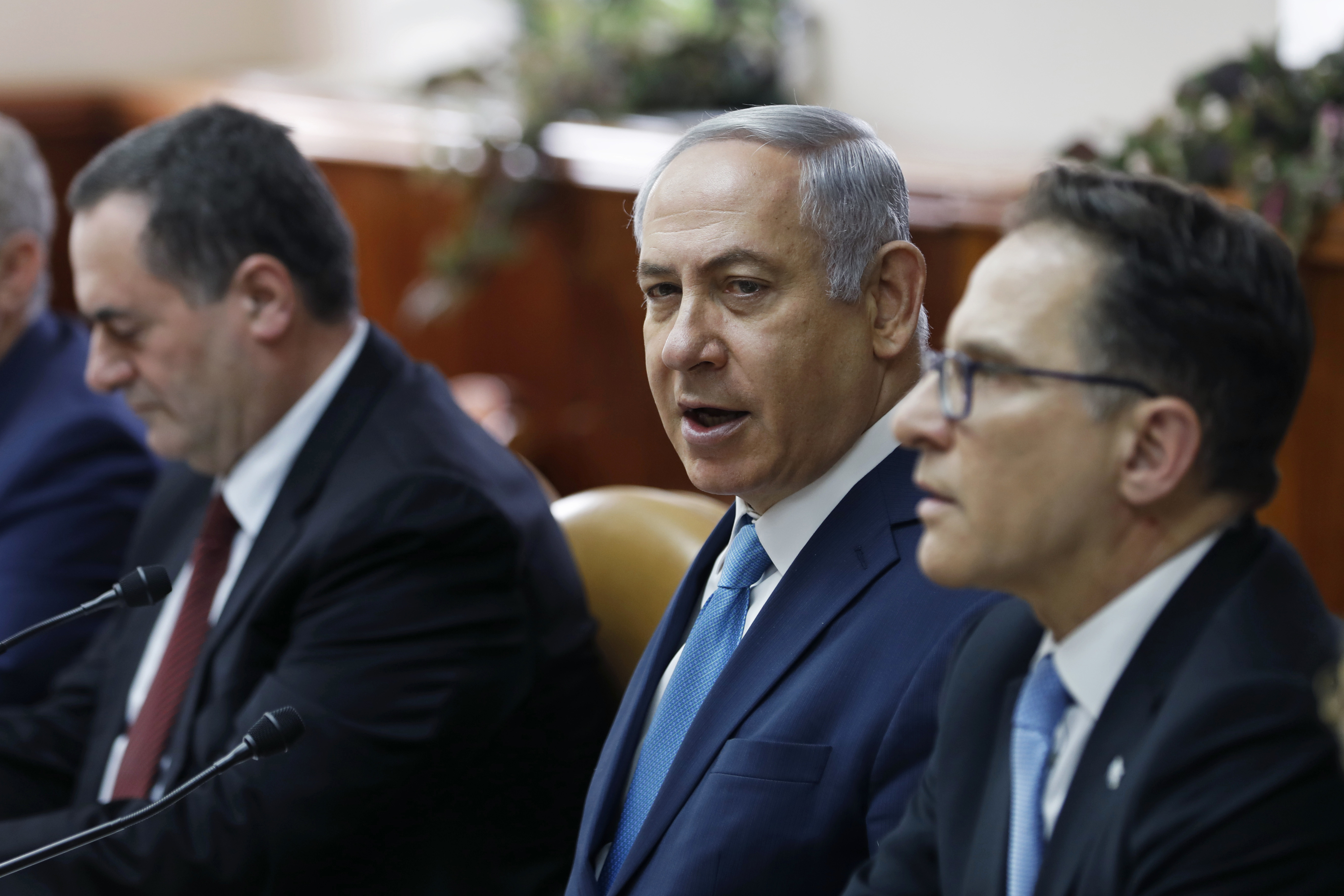 Benjamin Netanyahu's cabinet is thought to be backing him to continue (Ronen Zvulun/AP) 