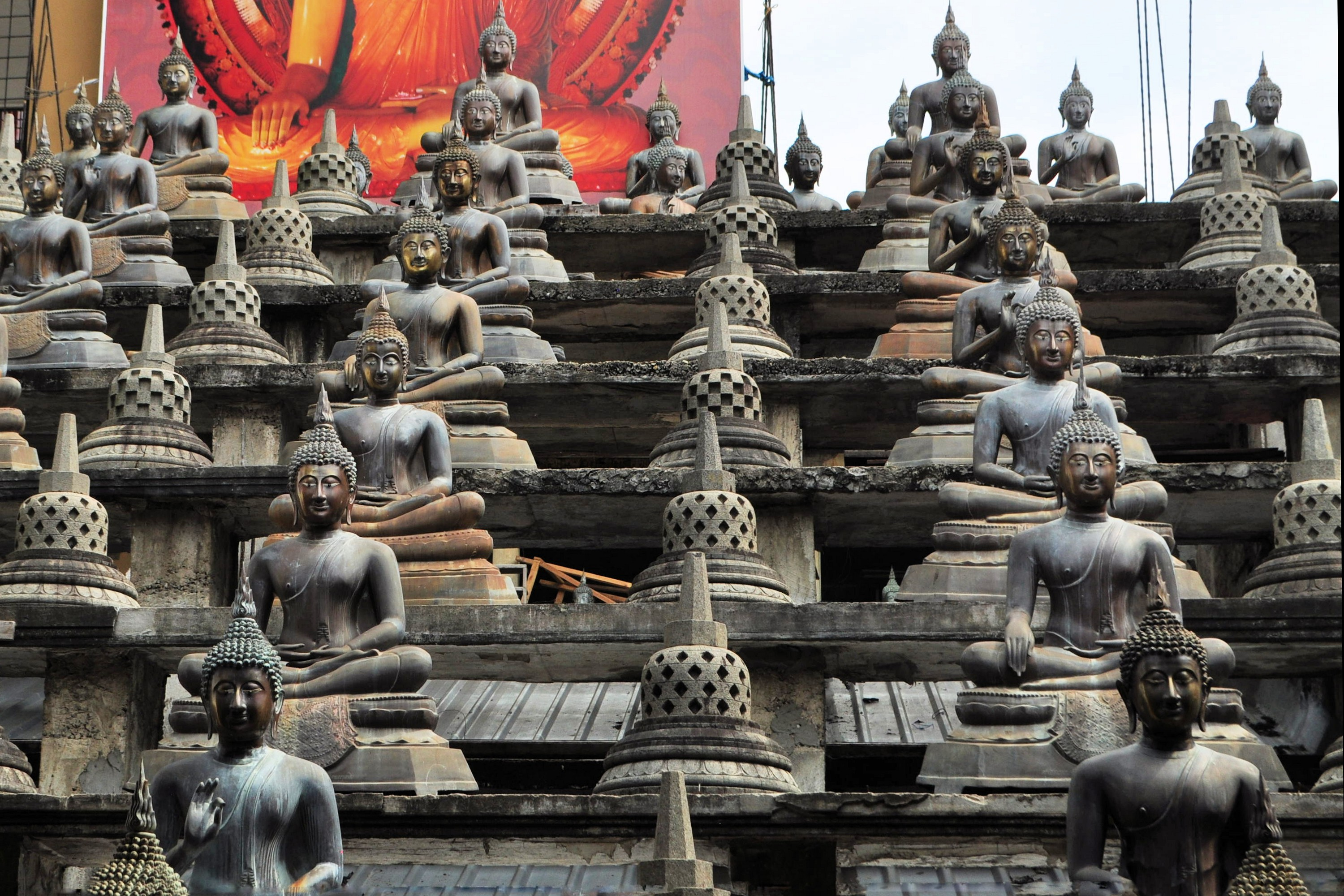 Buddha statues and small stupas in Gangaramaya temple. (Thinkstock/PA)