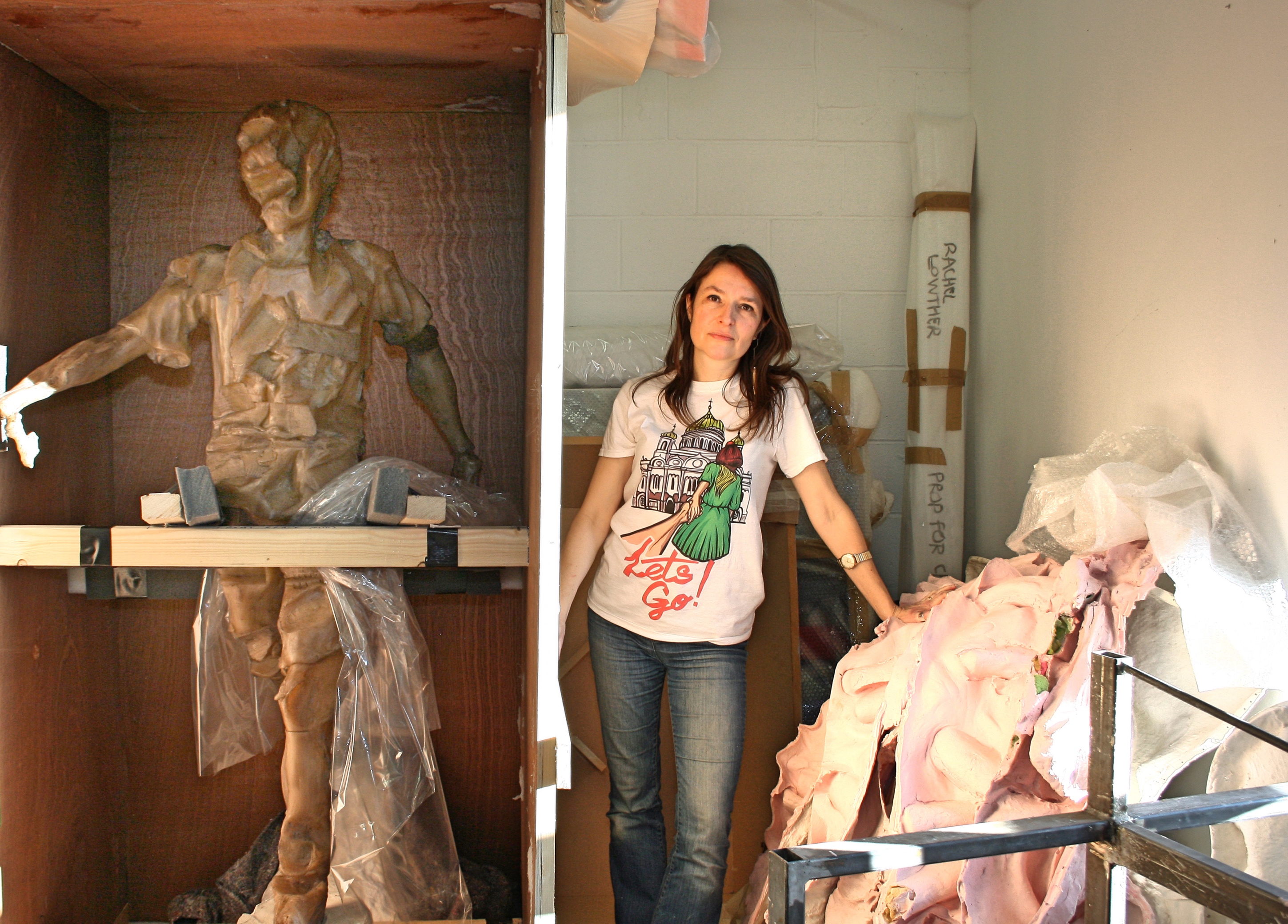 Rachel Lowther in her studio with stored sculpture Mohamed Plays (Kate V Robertson/PA)