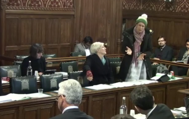 SNP MP Alison Thewliss tries to keep warm in a committee debate in Parliament
