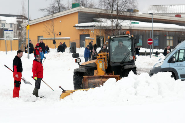 A plough was brought in to help clear the area around the school for pupils (Andrew Milligan/PA)