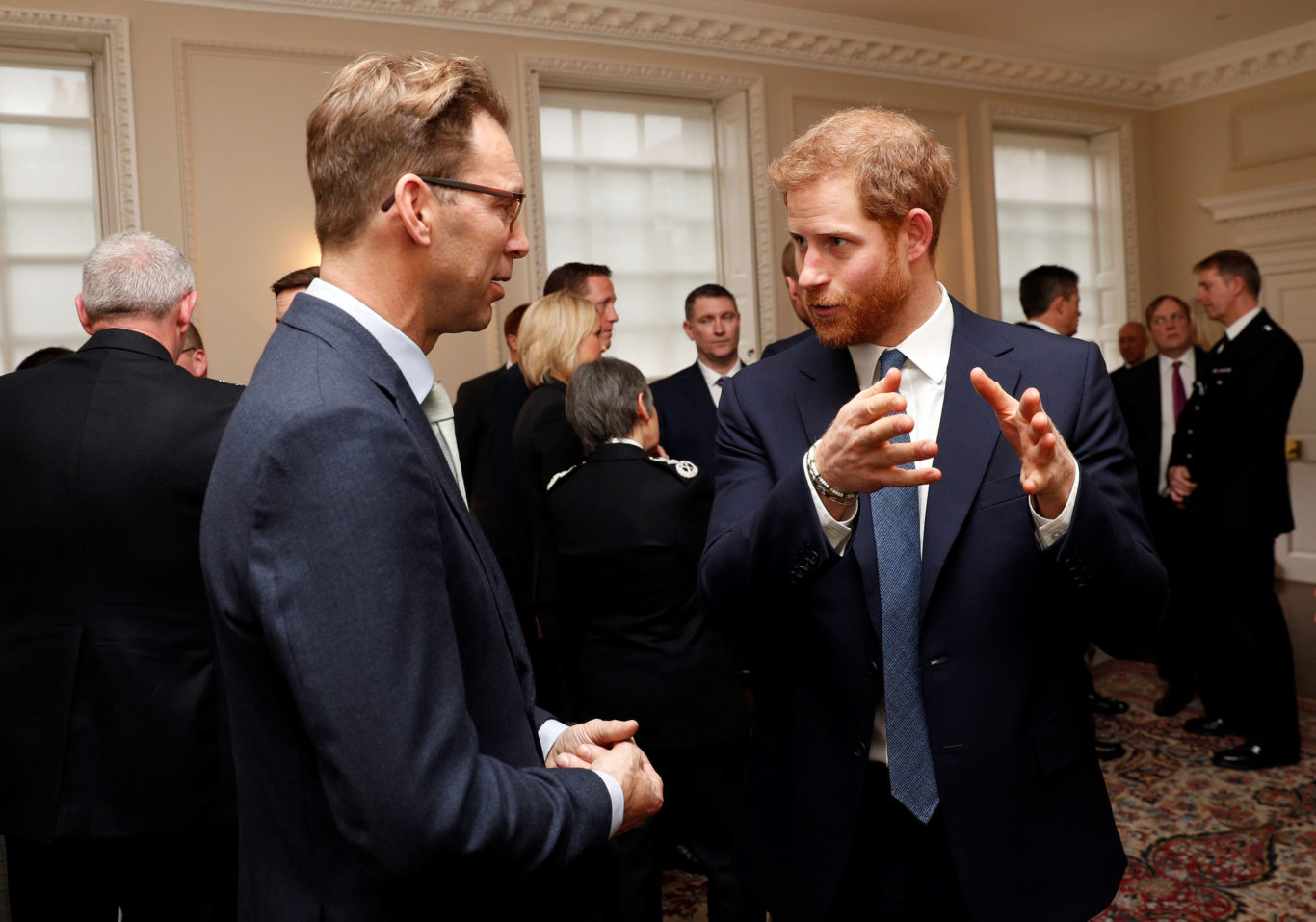 Prince Harry talks to Tobias Ellwood, who received a police bravery award at the Met Excellence Awards (Adrian Dennis/PA)