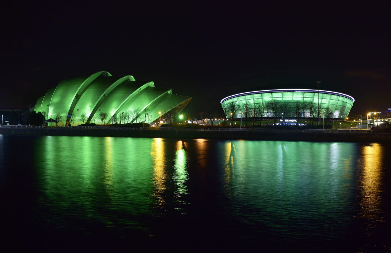 The SEC Armadillo and SSE Hydro are illuminated green in Glasgow by Tourism Ireland to mark St Patrick's Day (Sandy Young/PA)
