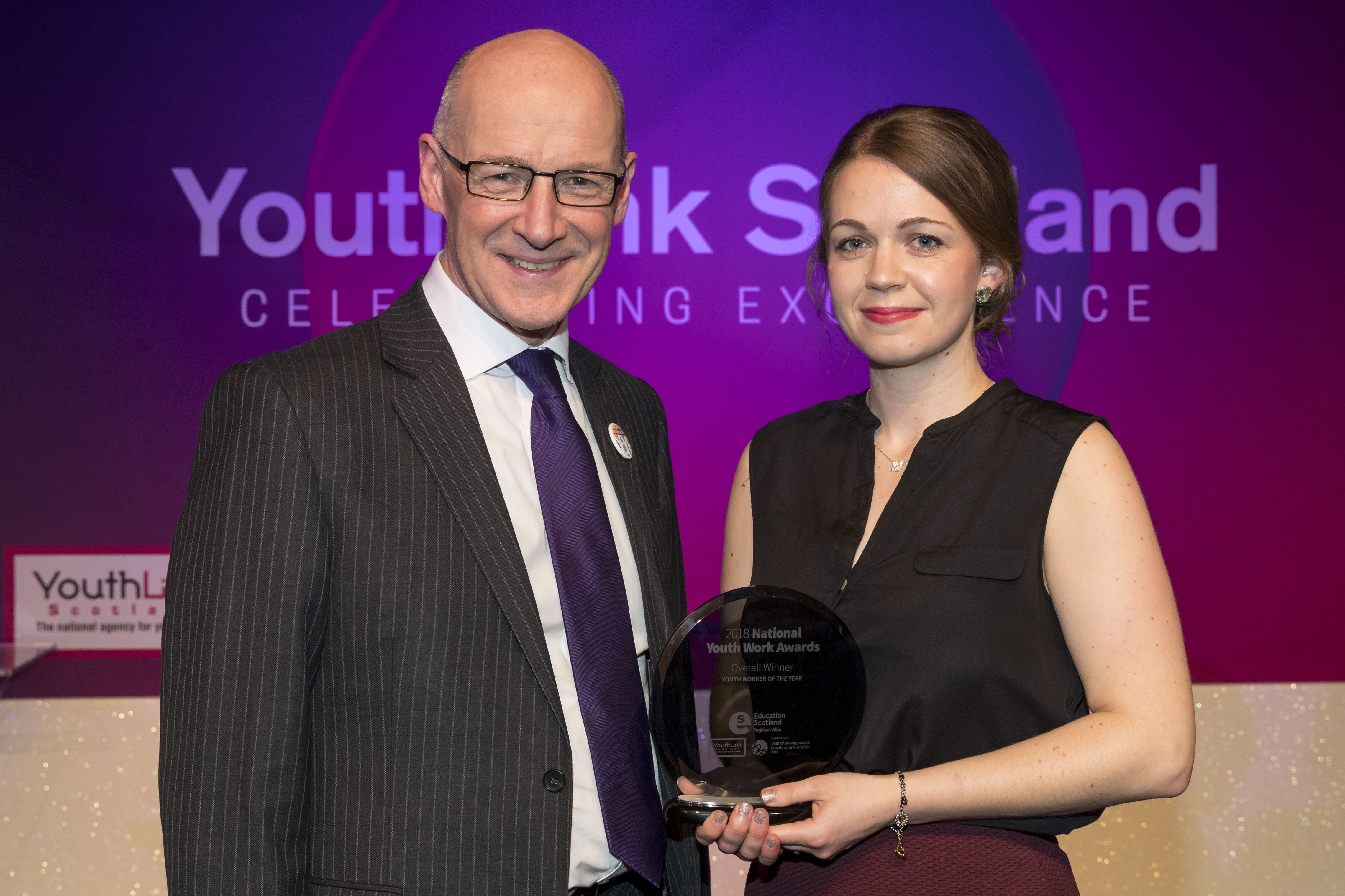 Deputy First Minister John Swinney and Matilda Lomas who has been named Scotland’s Youth Worker of the Year 2018 (Alan Rennie/YouthLink Scotland/PA)