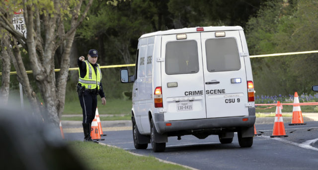 A police crime scene van near the site of Sunday's explosion (Eric Gay/AP)
