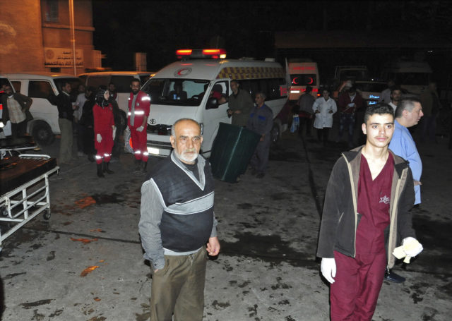 The aftermath of the assault on a market in the Kashkol neighbourhood (SANA via AP)