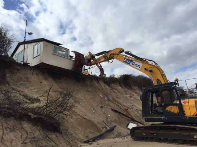 A clifftop home in Hemsby, Norfolk is demolished. (Sam Russell/ PA)
