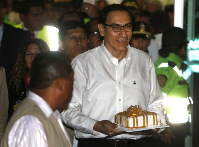 Martin Vizcarra arrives at Jorge Chavez International Airport in Lima (Karel Navarro/AP)