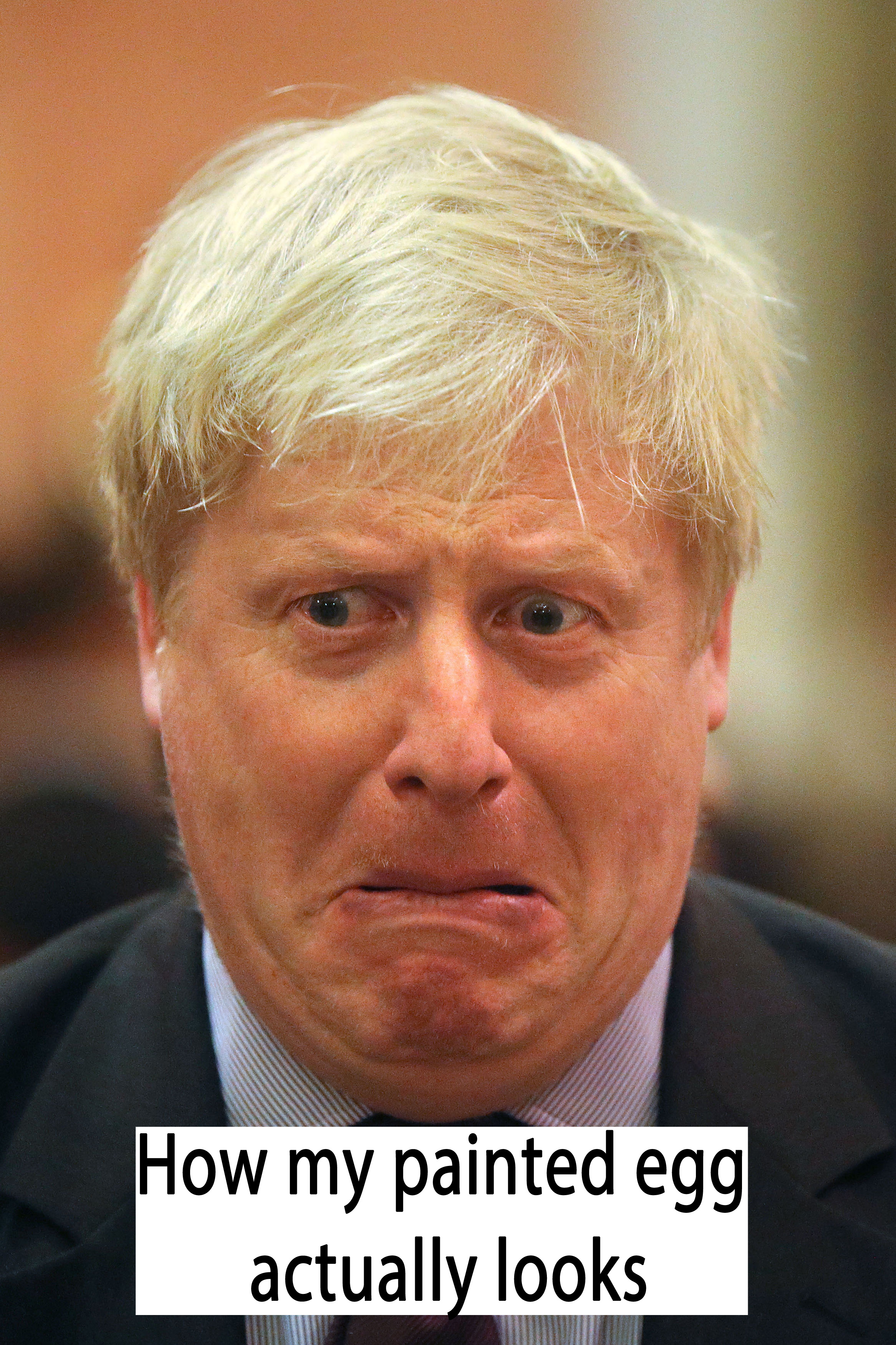 Boris Johnson representing a painted egg