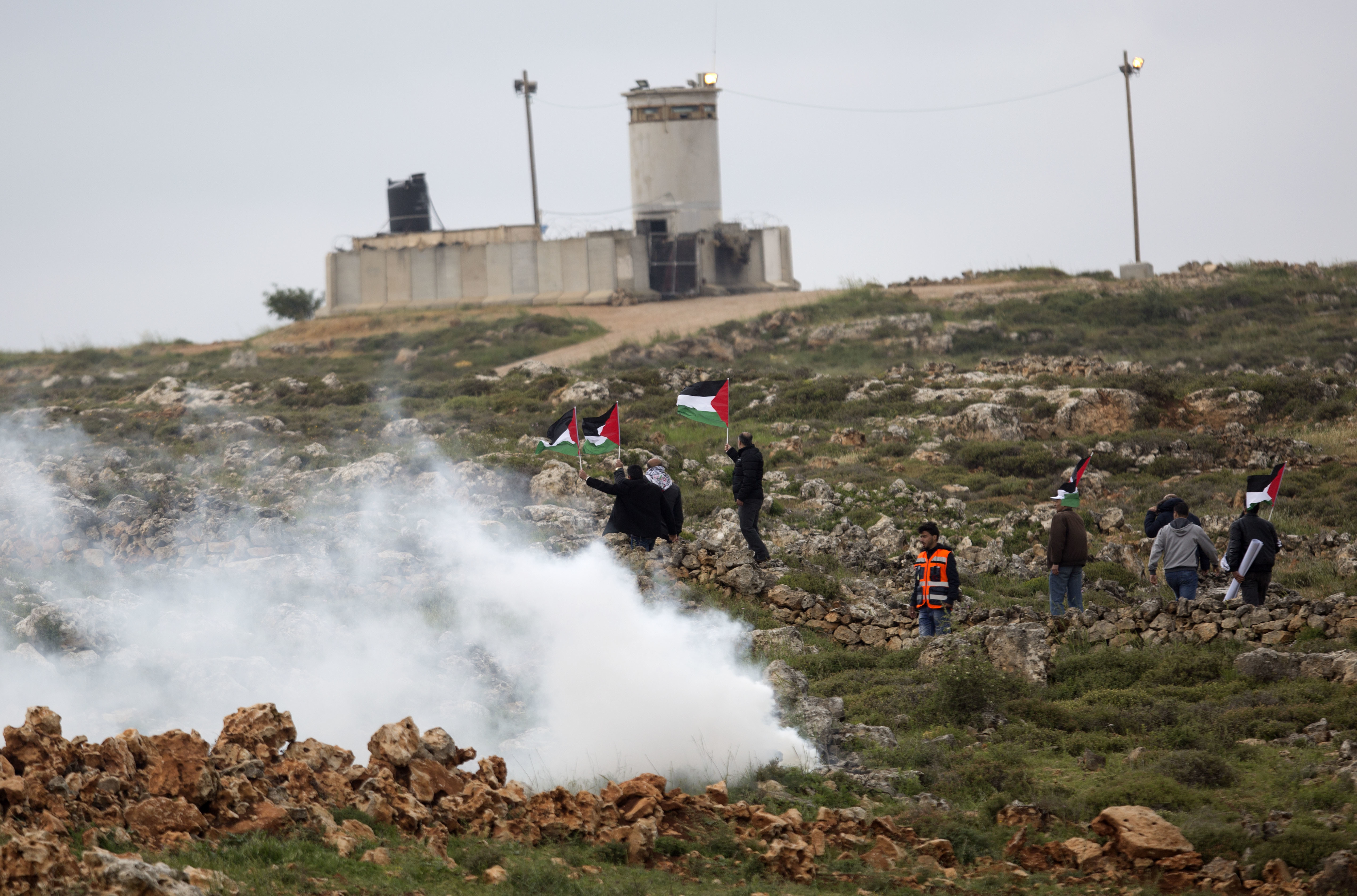 Palestinian protesters during the clashes (Majdi Mohammed/AP)