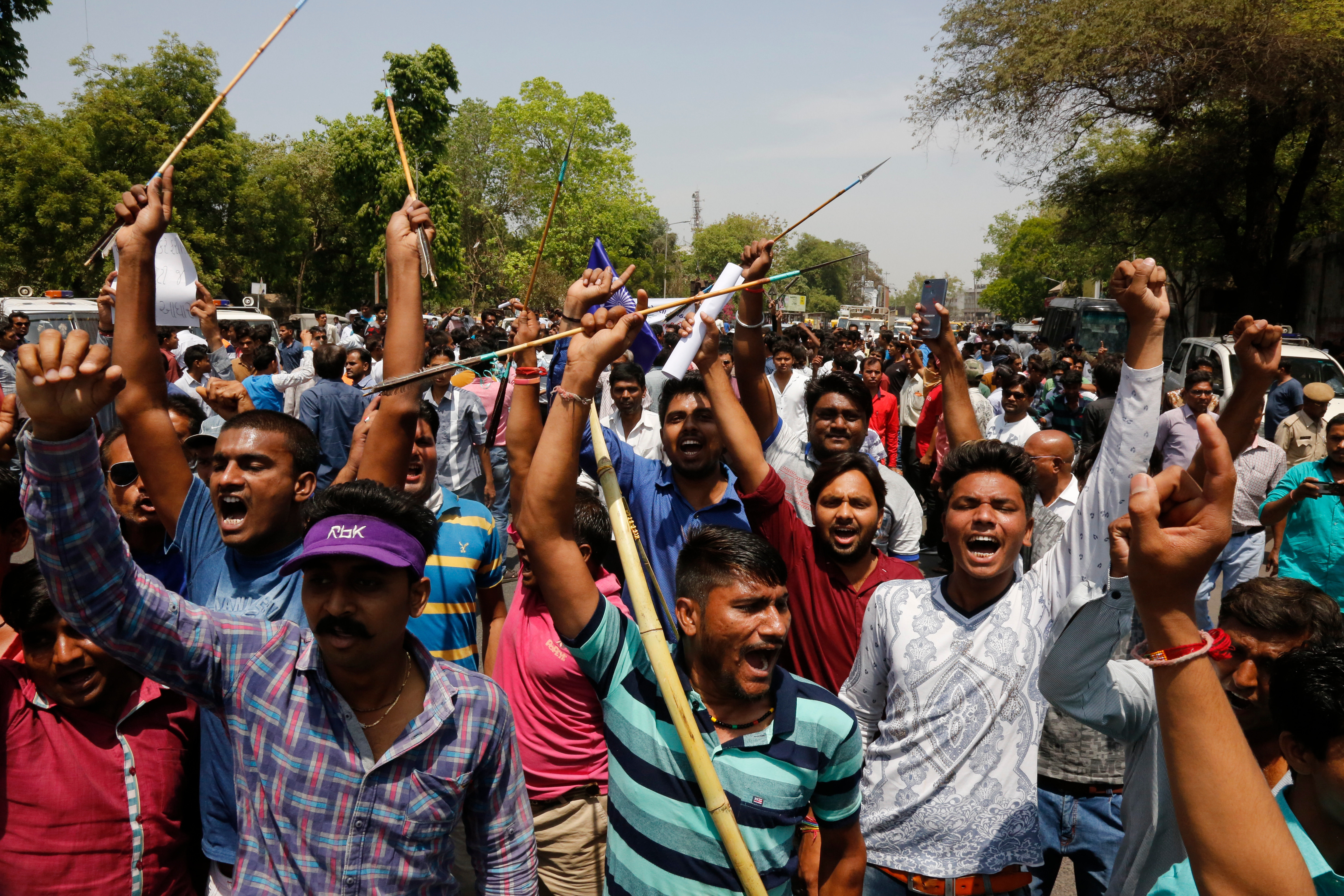 India’s lower caste dalits shout slogans during a nationwide strike in Ahmadabad (Ajit Solanki/AP)